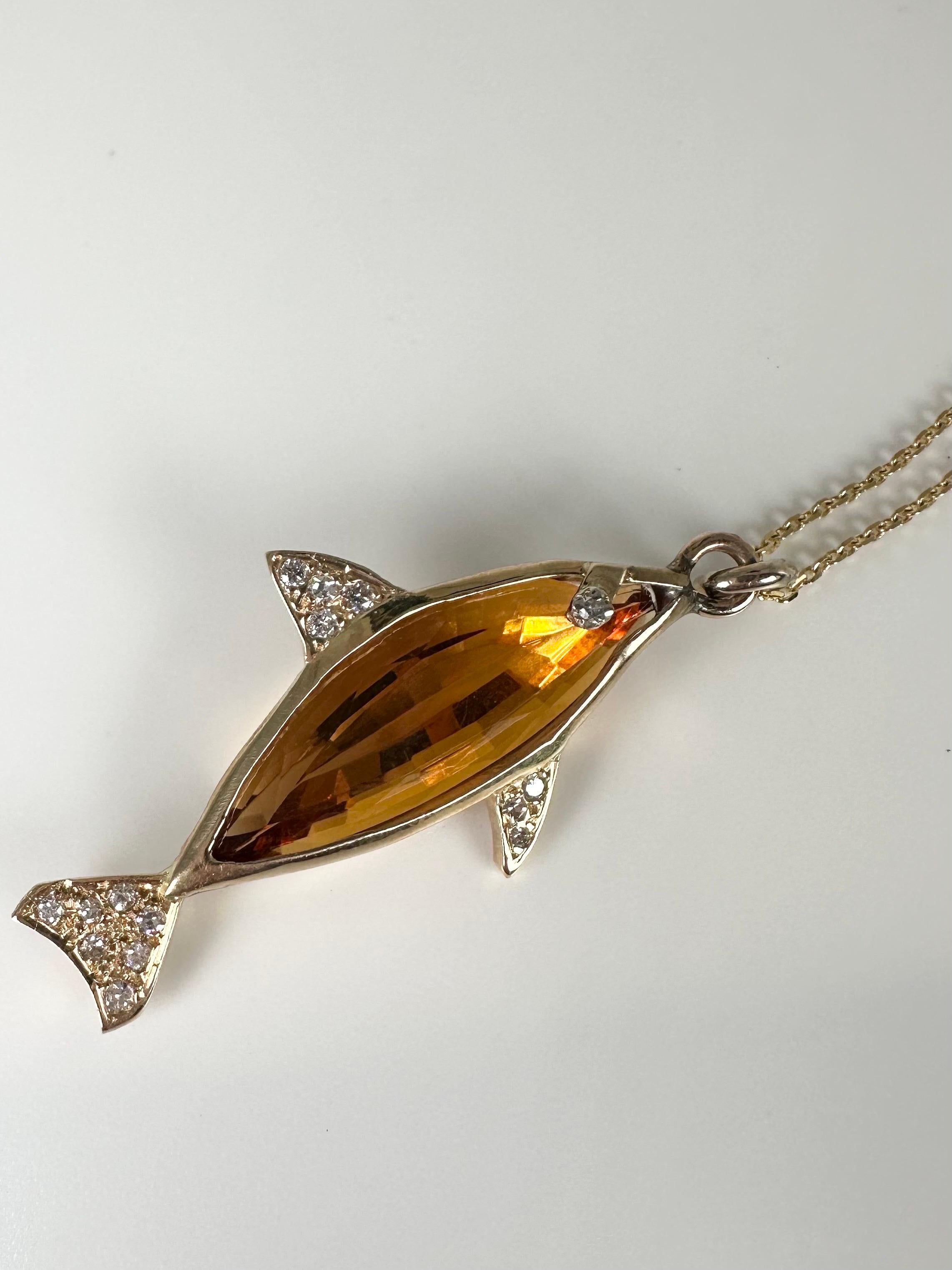 A fishers dream necklace, made with a natural citrine custom cut for the creation of this pendant, citrine of the most desired color called cognac its stunning orange with a hint of wood color. The pendant is made in 14KT yellow gold, 18