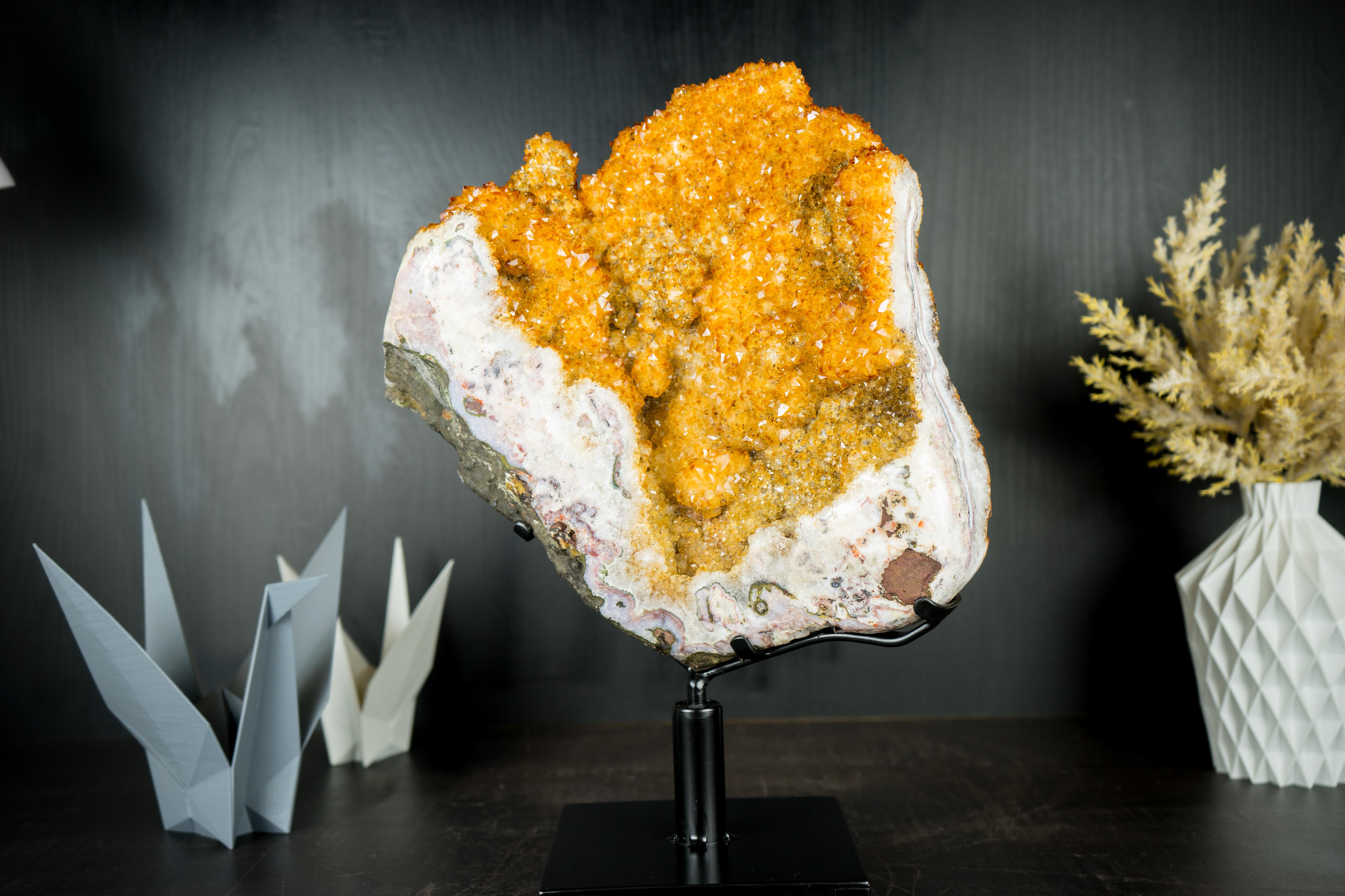 AAA Citrine Cluster with Madeira Citrine Druzy and Geometrical Calcite, Self-Standing

▫️ Description

With colors resembling a Marigold or a Sunflower in full bloom and a shape that evokes alpine mountains, this Citrine Flower Cluster boasts