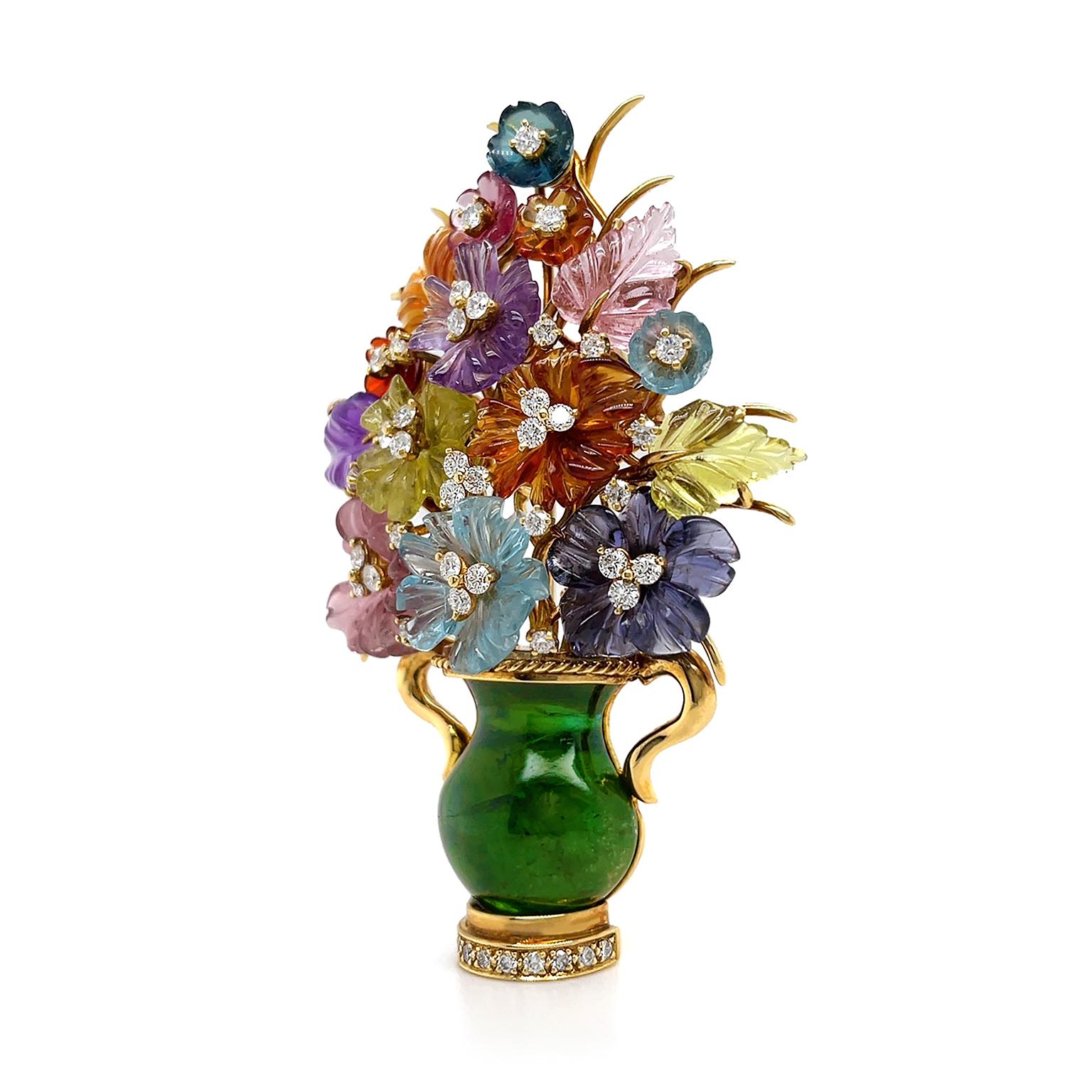 Jeweled blossoms overflow in abundance. Colored citrines are carved to form flowers of various sizes and leaves. Brilliant cut diamonds, with colorless DEF hues and VVS clarity, provide sparkling depth in the center of each flower and nestle in