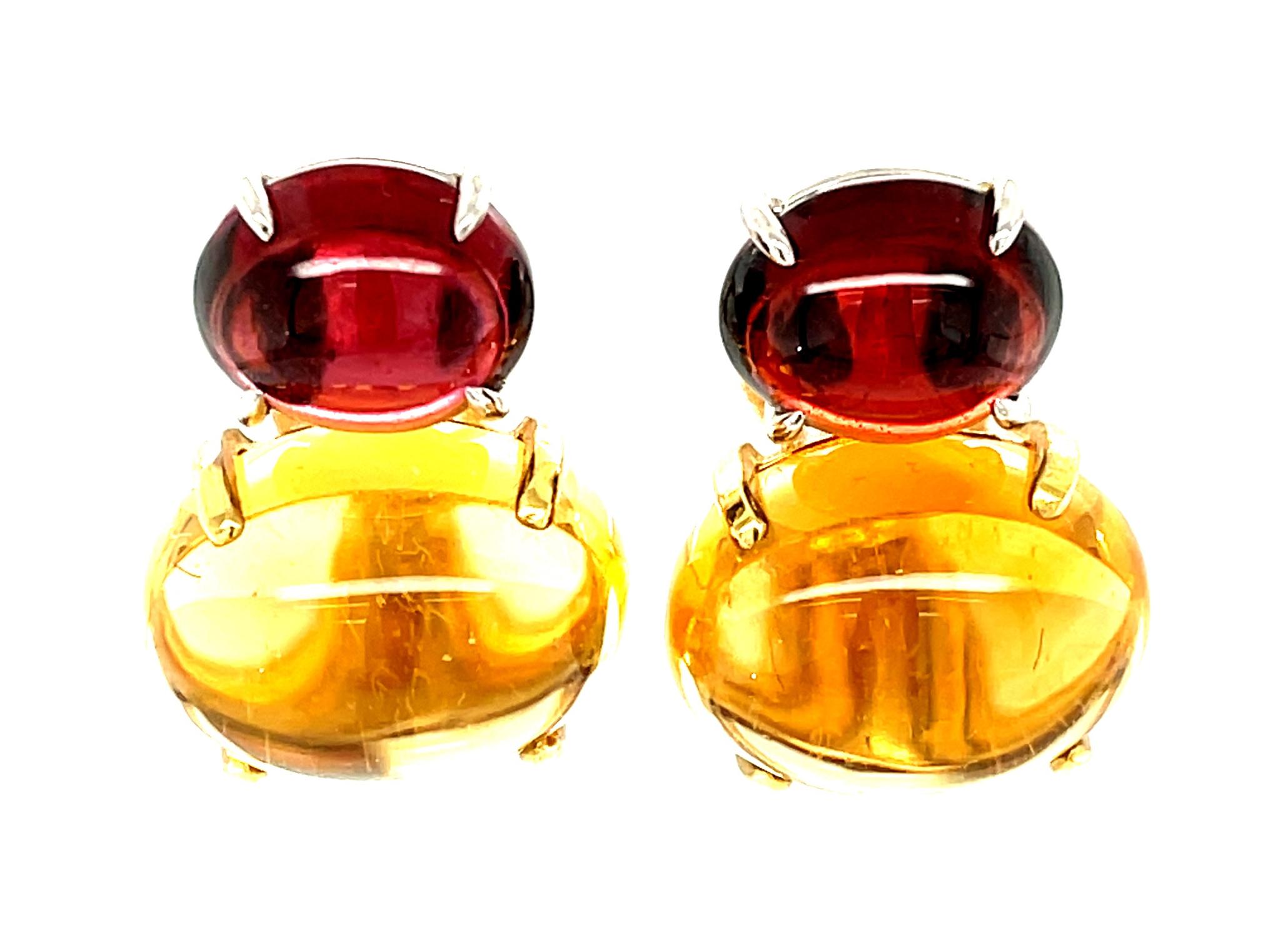 These striking earrings feature very large, golden citrine cabochons and burgundy-red garnet cabochons in a classic, warm color combination. Both the citrine and garnets are extremely clean and transparent, which is unusual for cabochons. Handmade
