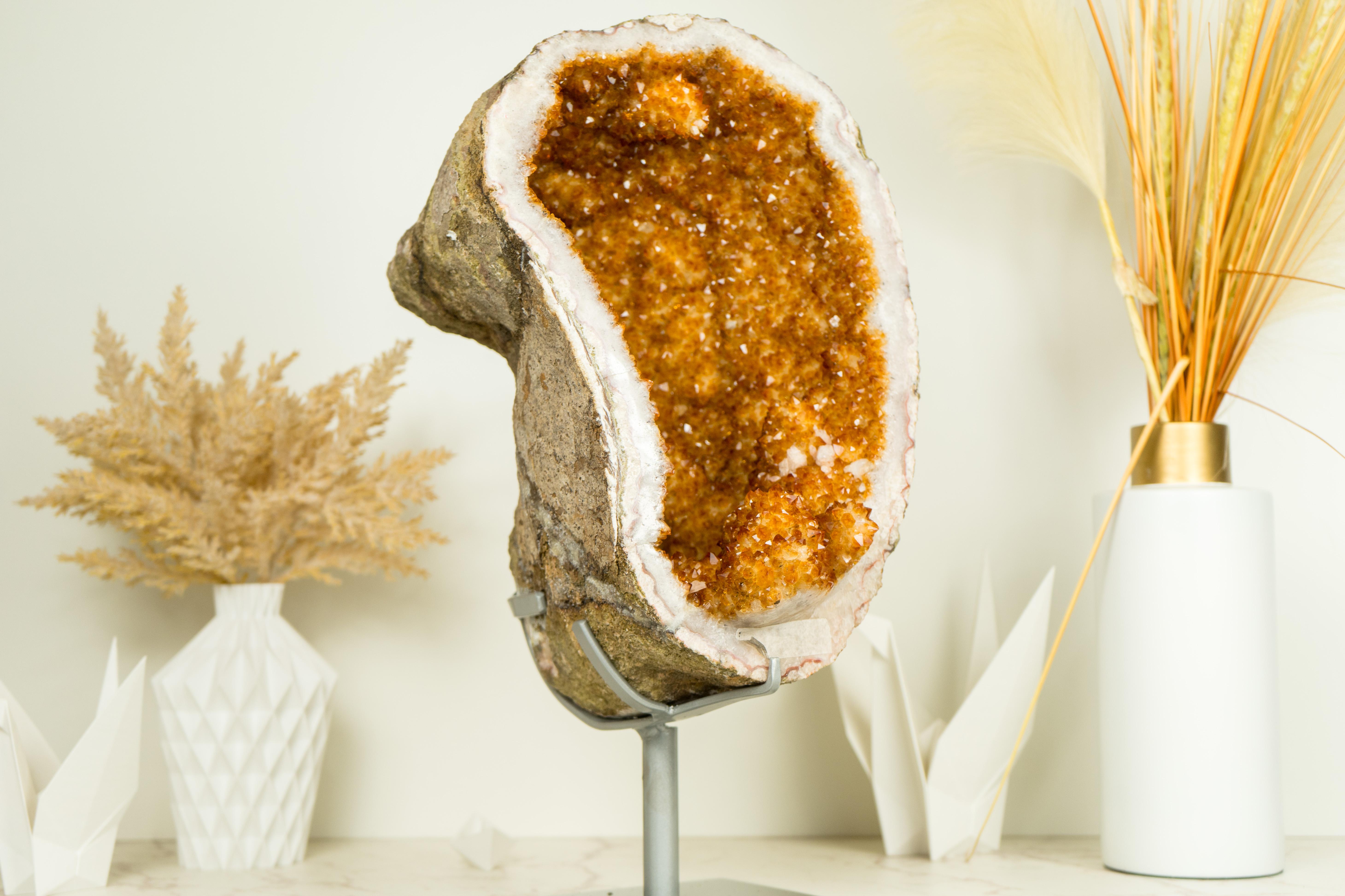 A World-Class, AAA Citrine Geode that embodies world-class characteristics and stunning aesthetics. Elegantly formed, this geode showcases exceptional druzy quality, sparkling with flawless crystal formations. This Citrine is undeniably a
