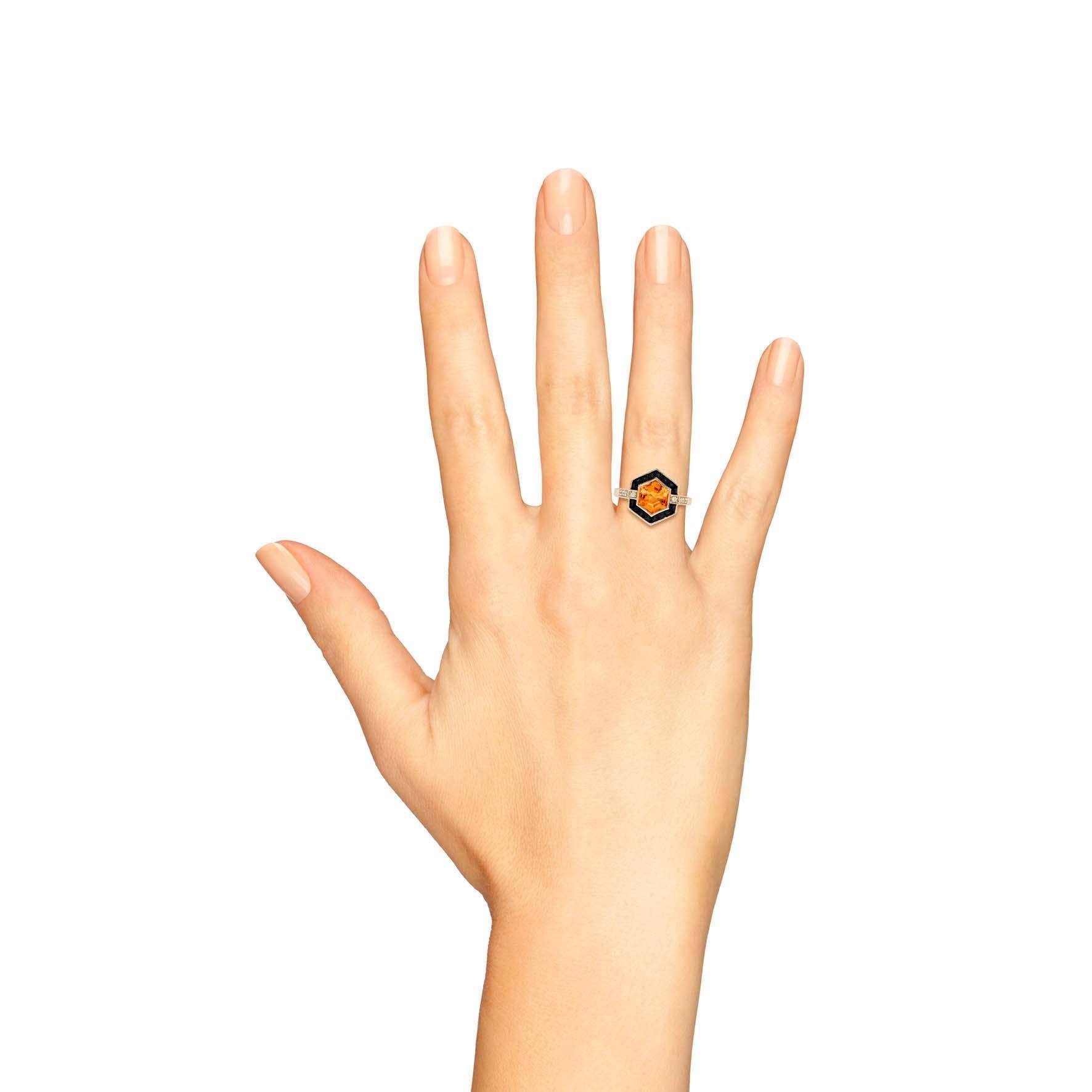 Unveil timeless elegance with our Citrine Onyx Diamond Art Deco Style Hexagon Ring in 14K Yellow Gold. The captivating hexagonal design features a sunshine citrine, complemented by bold black onyx and surrounded by sparkling diamonds. Inspired by