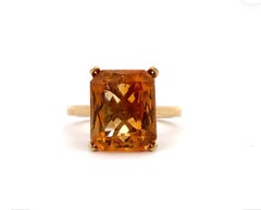 Anello cocktail con gemma arancione citrino in oro giallo 18 carati