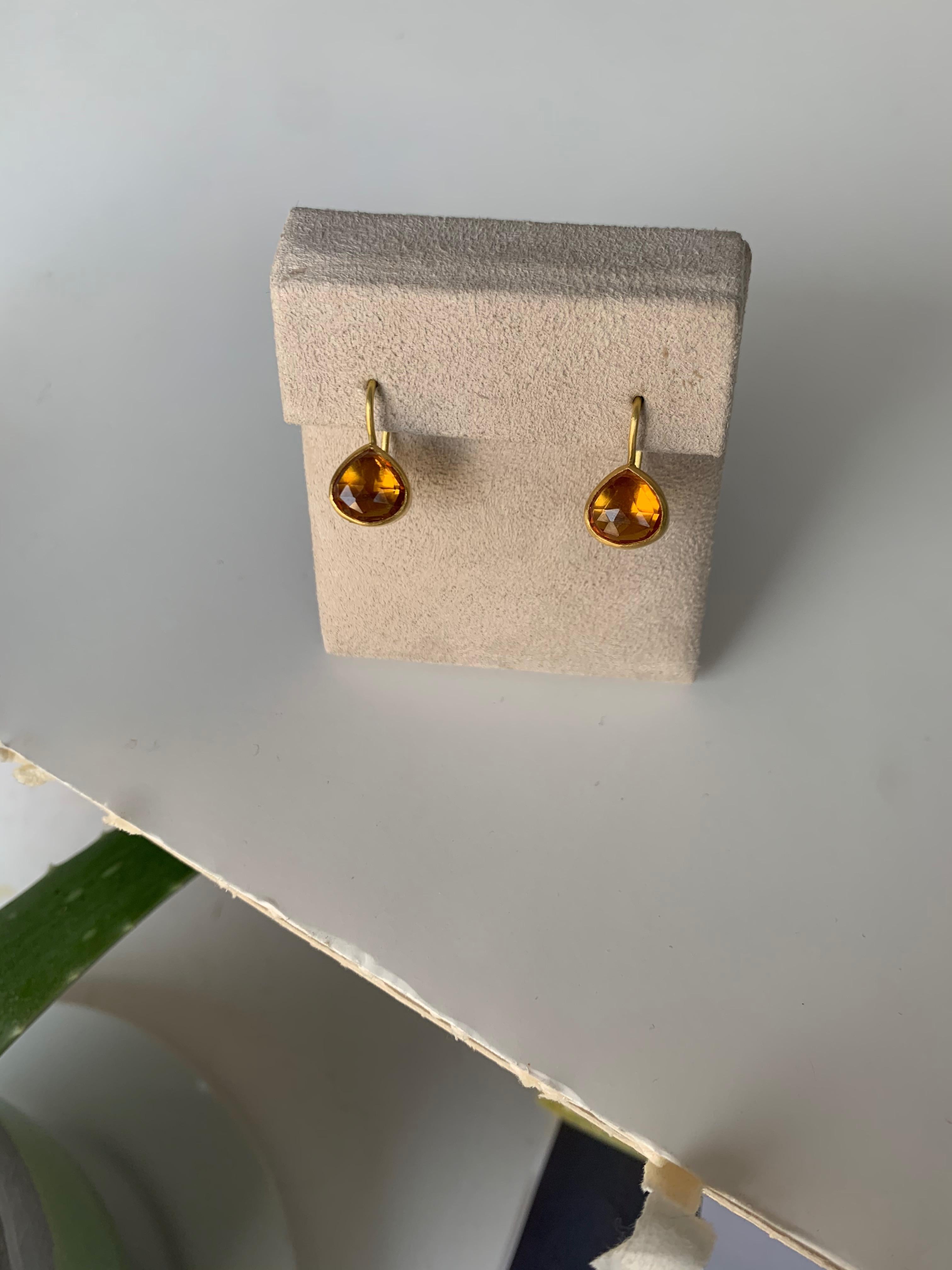 Lovely and vibrant Citrine earrings. Citrines are often associated with the sun and the energy it provides, of deep yellow-orange hue these will wear easily all day and go with everthing . Super comfortable they are set in 22 Karat gold and 20 Karat