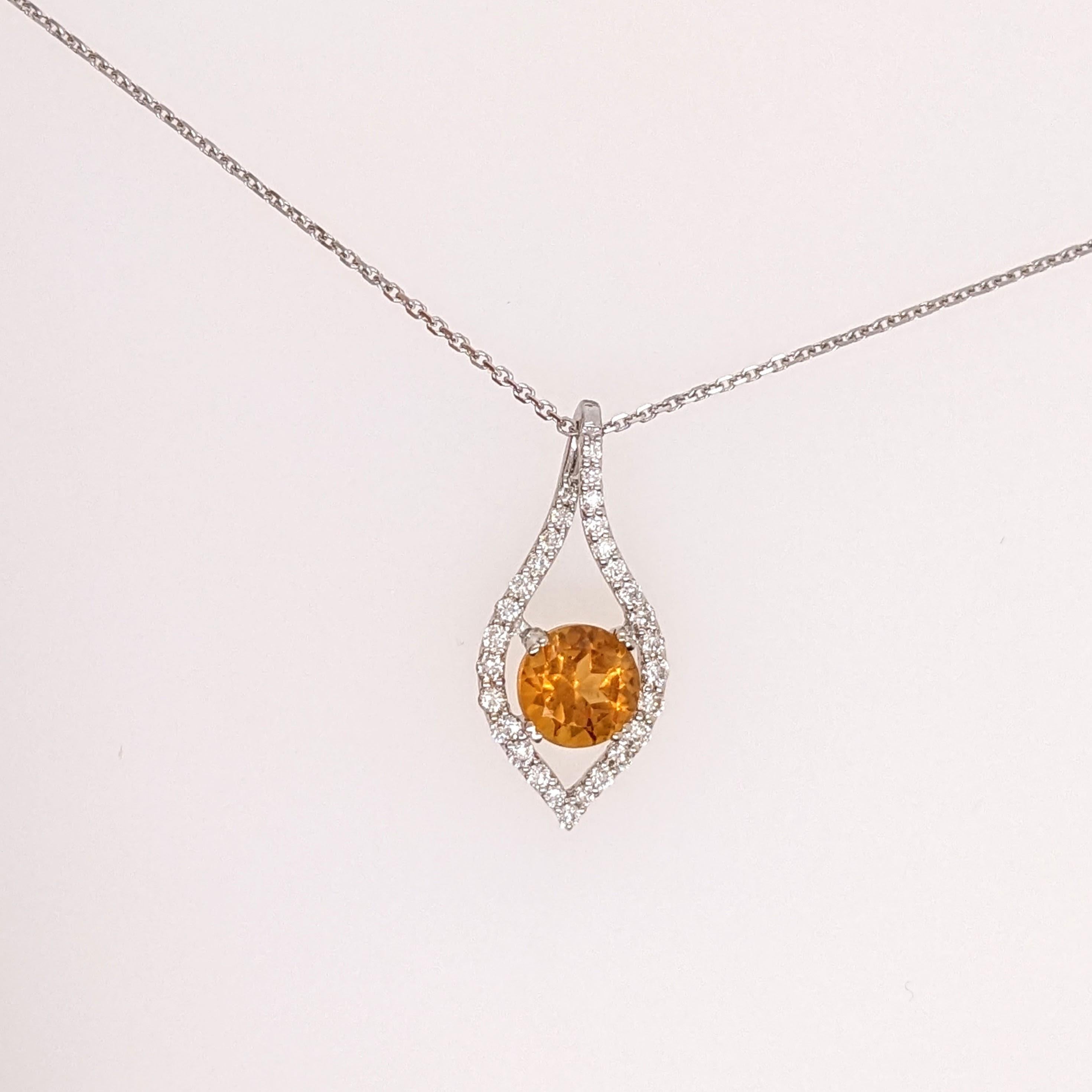 This beautiful pendant features a 0.92 carat round citrine with natural earth mined diamonds, all set in solid 14k gold. A unique pendant design to add to your collection and for everyday wear!

Specifications

Item Type: Pendant
Center