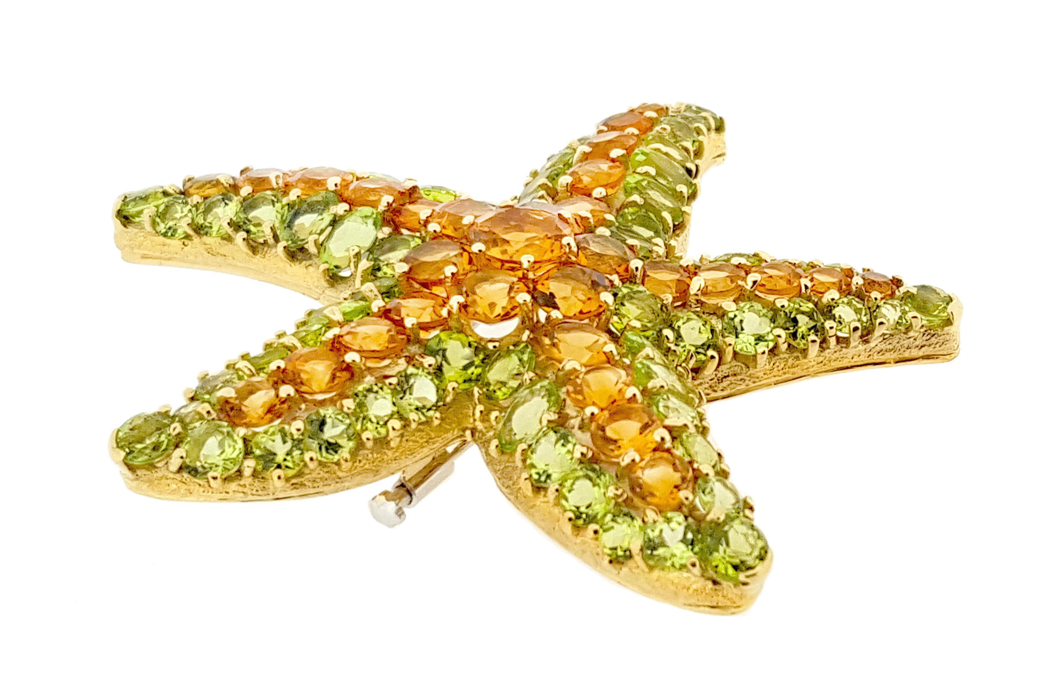 Starfish brooch, set with a center of circular-cut citrines within an outer frame of circular-cut peridots, in 18k yellow gold. Citrines weighing approximately 7.00 total carats and peridots weighing approximately 10.00 total carats. 2.75