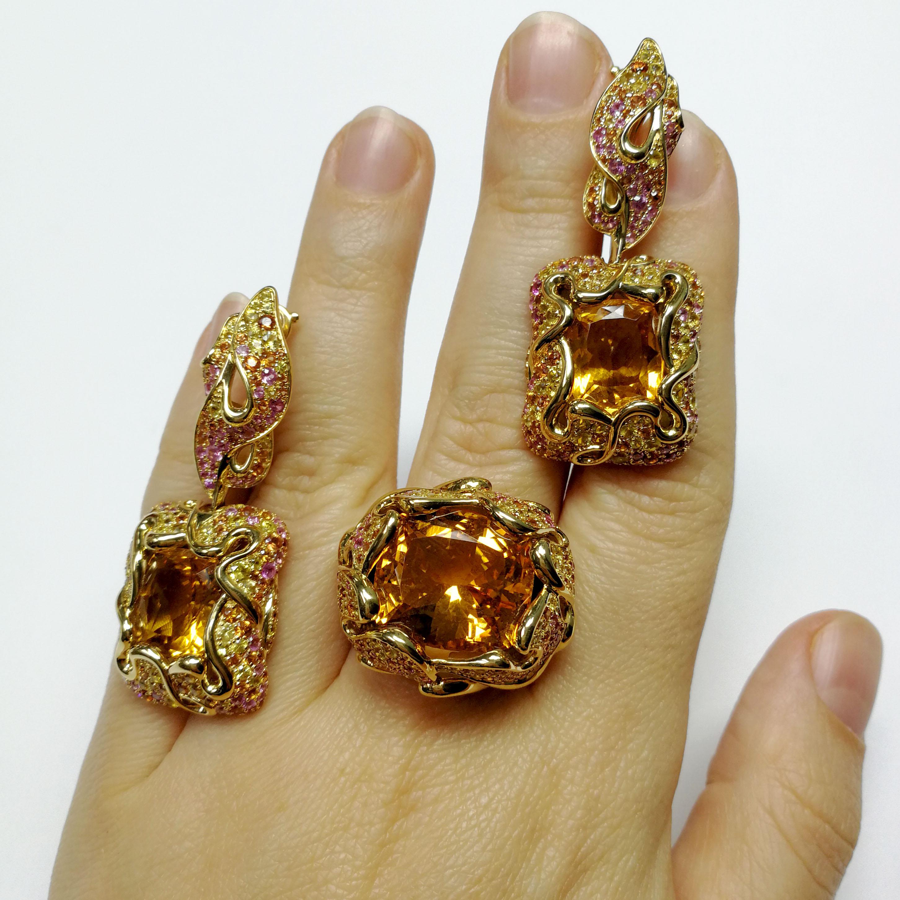 Citrine Pink Yellow Orange Sapphire 18 Karat Yellow Gold Suite
In early June in the gardens bloom luxurious flowers - peonies. Romance and mystery of peonies always attracted and allured artists. Our designers created this Ring, inspired by this