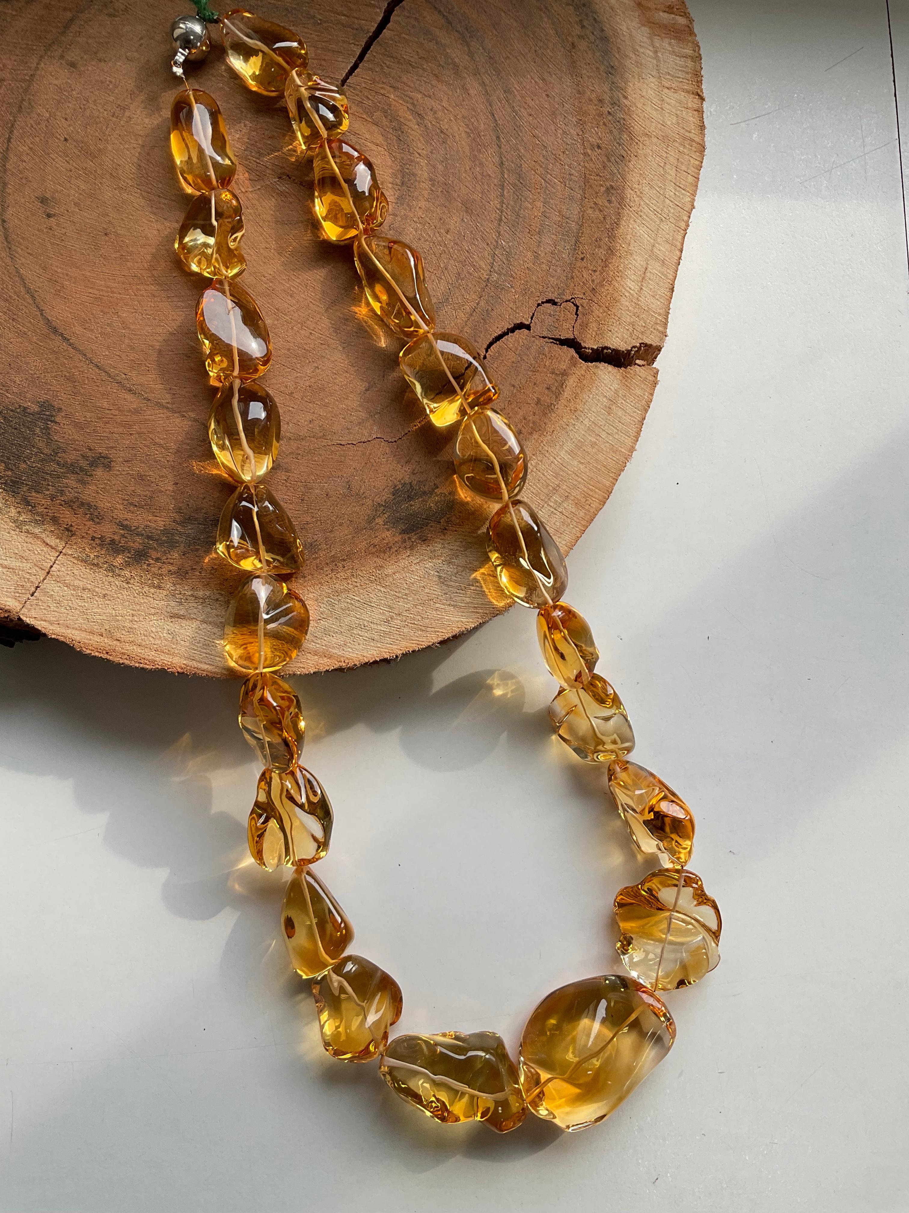 Citrine Quartz Beaded Jewelry Necklace Gem quality
Size : 13 X 20 To 27 X 37 MM 
Weight : 886 Carats
Length Of Necklace : 21 Inch 
Pieces : 23 Gems 