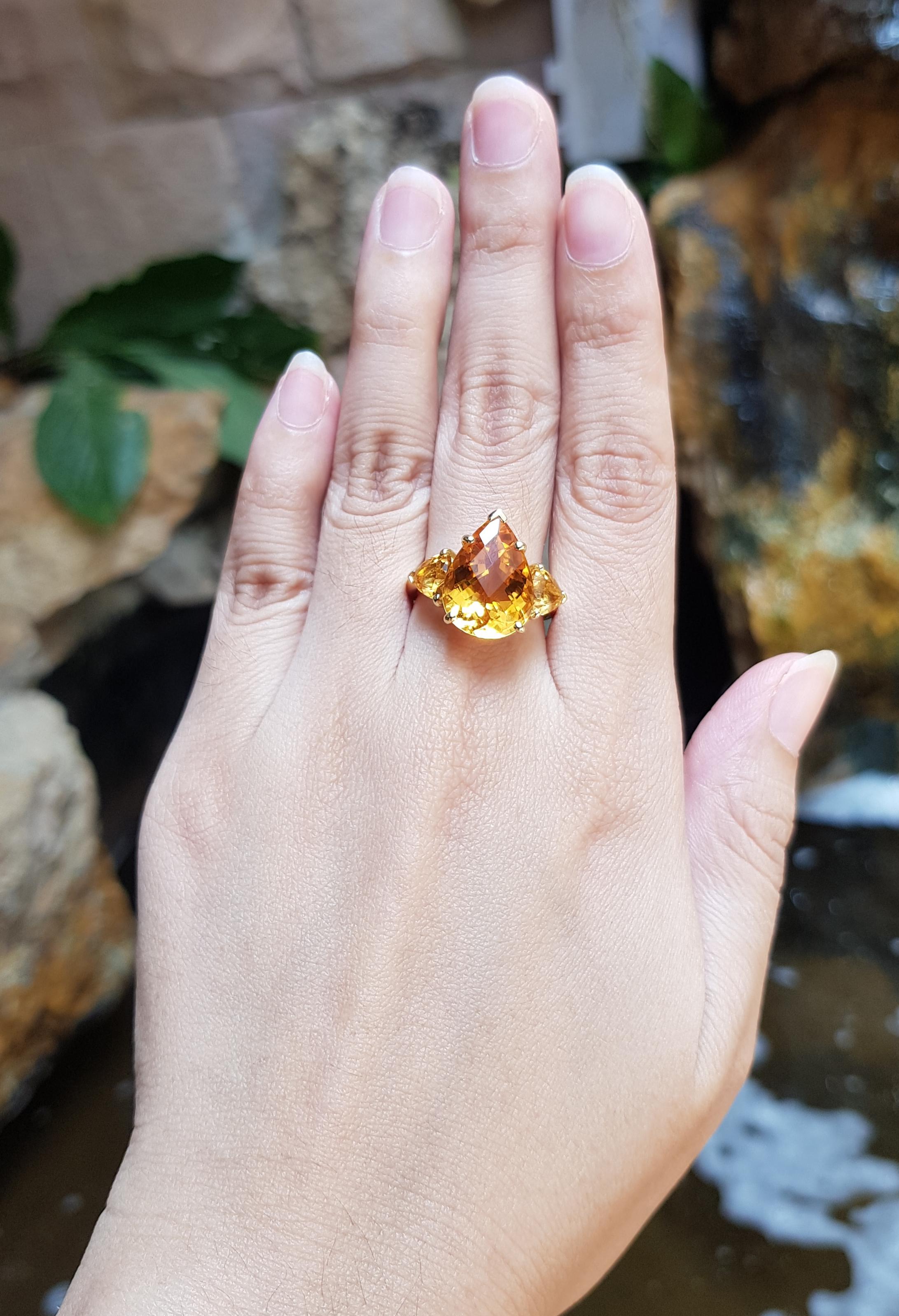 Citrine 6.90 carats with Citrine 1.47 carats Ring set in 18 Karat Gold Settings

Width:  2.2 cm 
Length: 1.7 cm
Ring Size: 54
Total Weight: 9.98 grams

