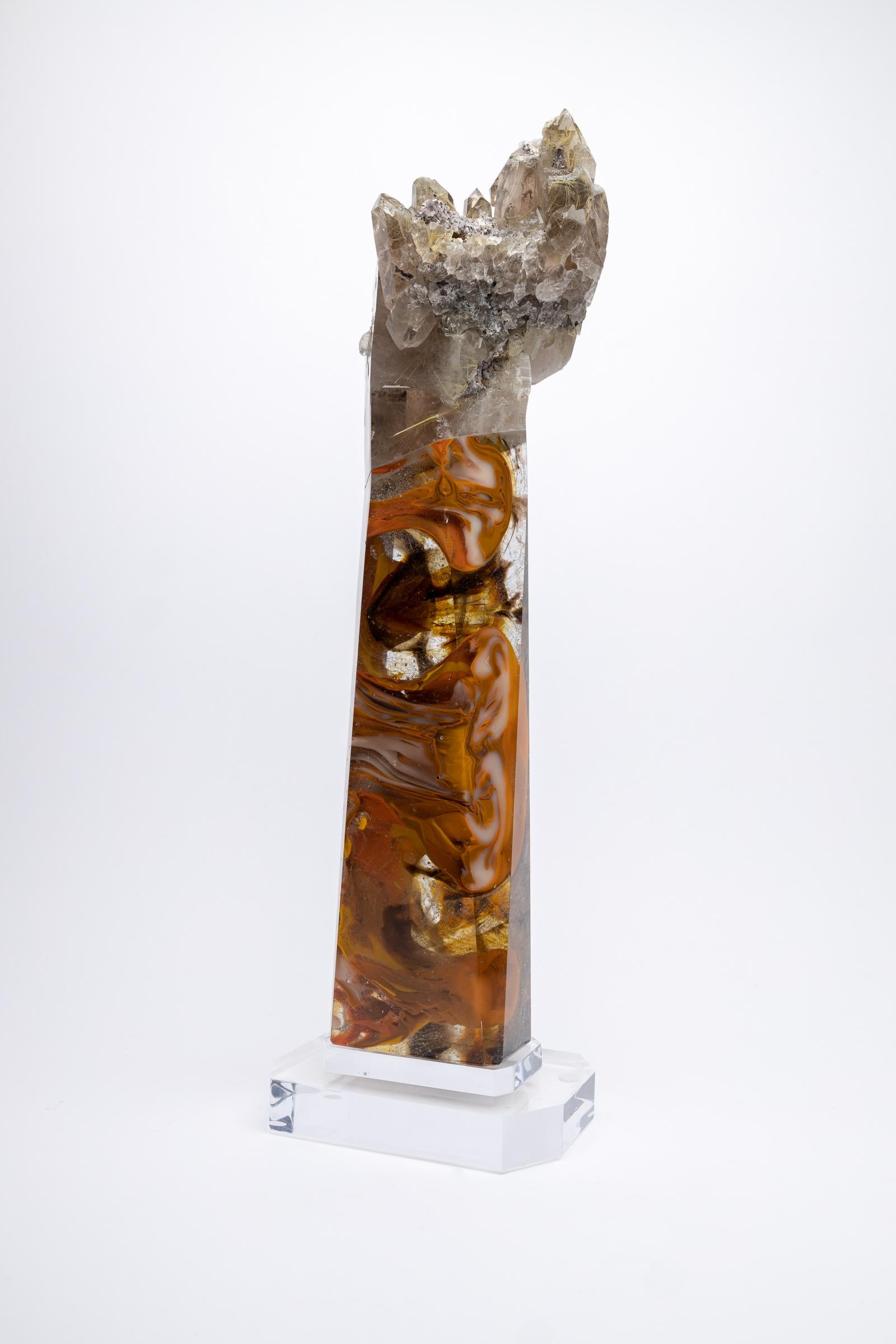 Sawuman, Citrin Rutilquarz und Glasskulptur aus der TYME Collection, eine Collaboration von Orfeo Quagliata und Ernesto Durán

TYME Collection'S 
Ein Tanz zwischen Reinheit und Detail bringt einzigartige Stücke hervor, die die Edelsteine der