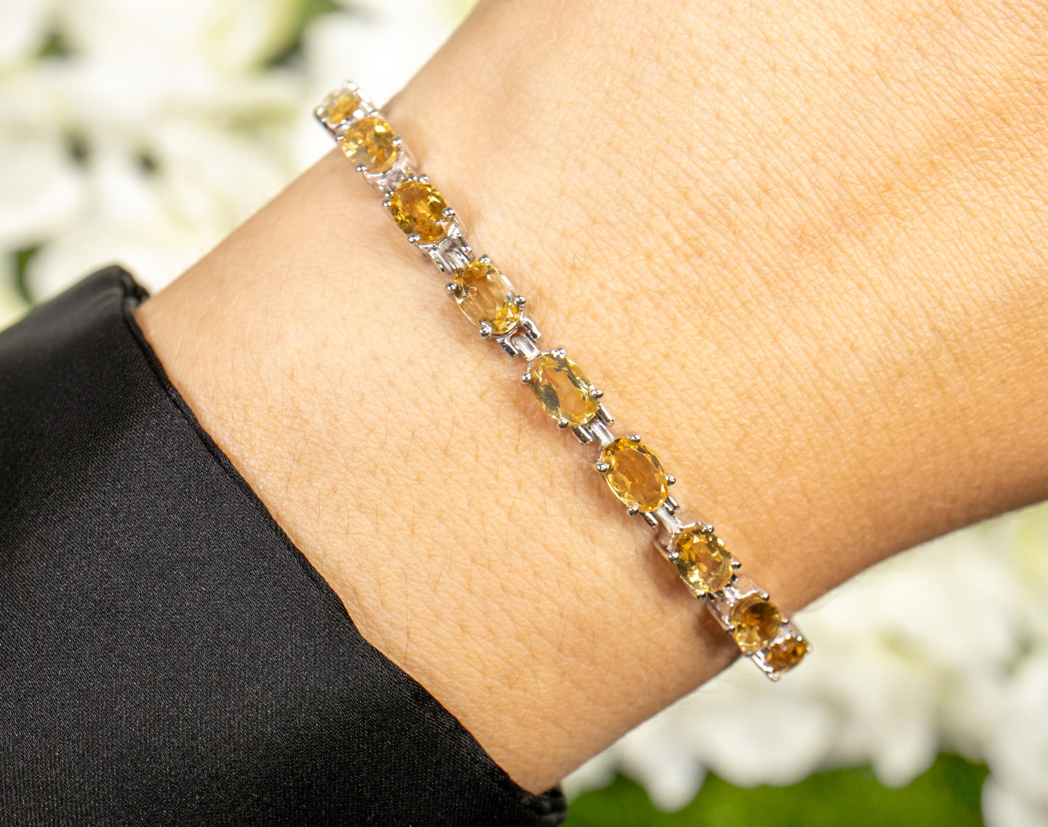 Contemporary Citrine Tennis Bracelet 9 Carats Oval Cut Rhodium Plated Silver For Sale