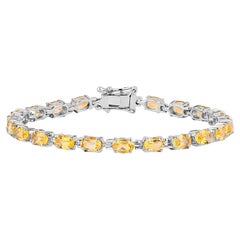 Pulsera de Tenis de Citrino 9 Quilates Talla Ovalada Chapada en Rodio Plata