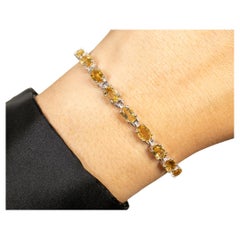 Pulsera de Tenis de Citrino 9 Quilates Talla Ovalada Chapada en Rodio Plata