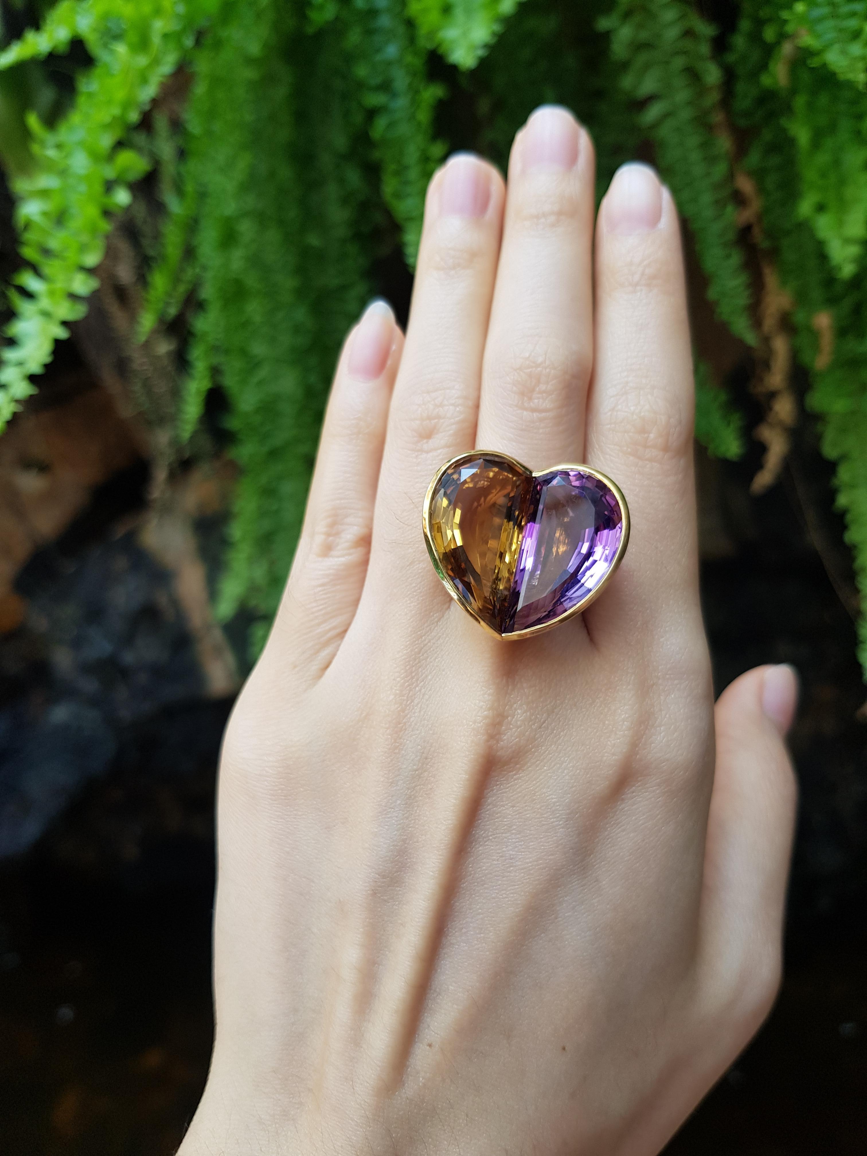 Citrin 17,17 Karat mit Amethyst 19,11 Karat Ring in 18 Karat Goldfassung

Breite: 2,8 cm
Länge: 2,5 cm 
Ringgröße: 56

