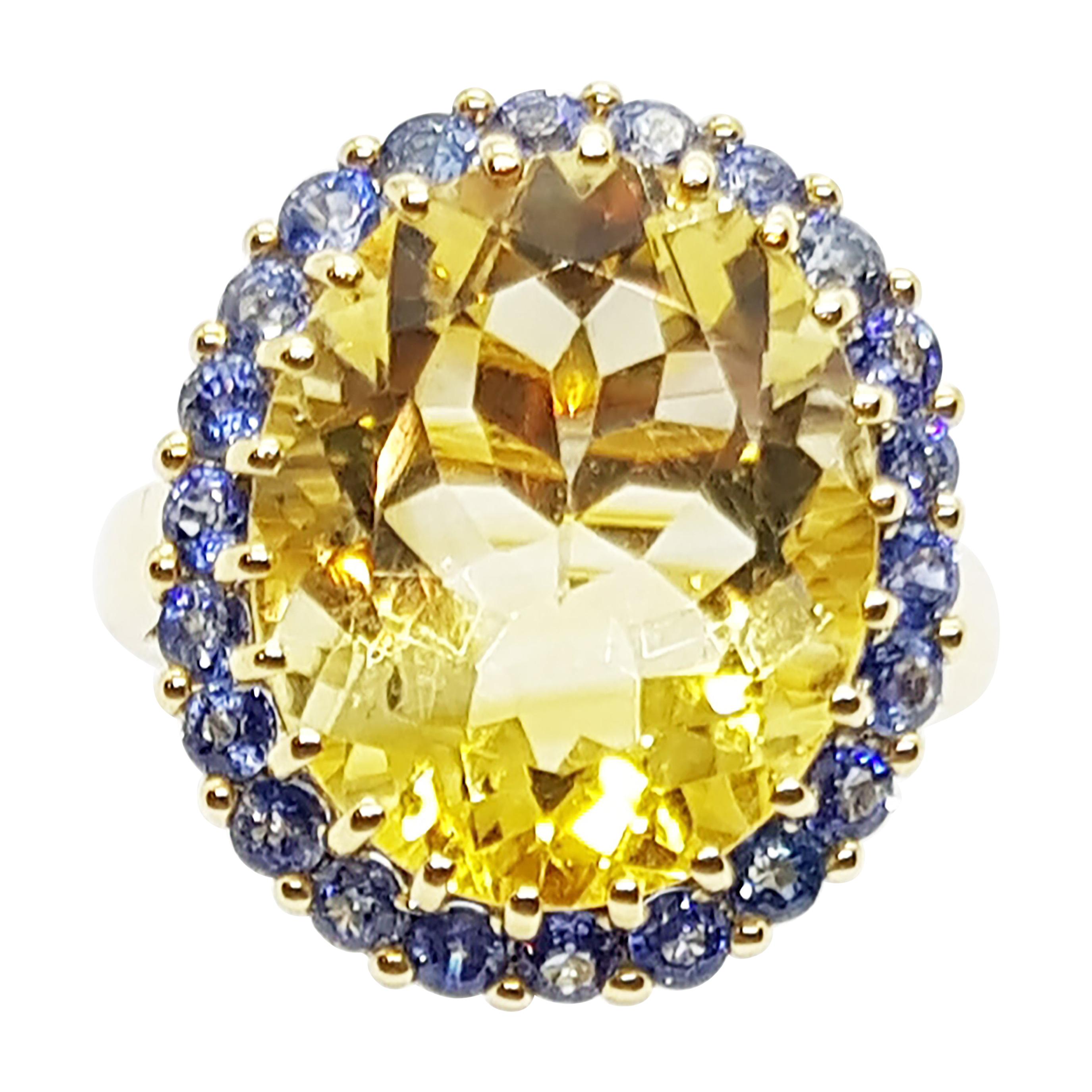 Bague en or 18 carats avec citrine et saphir bleu