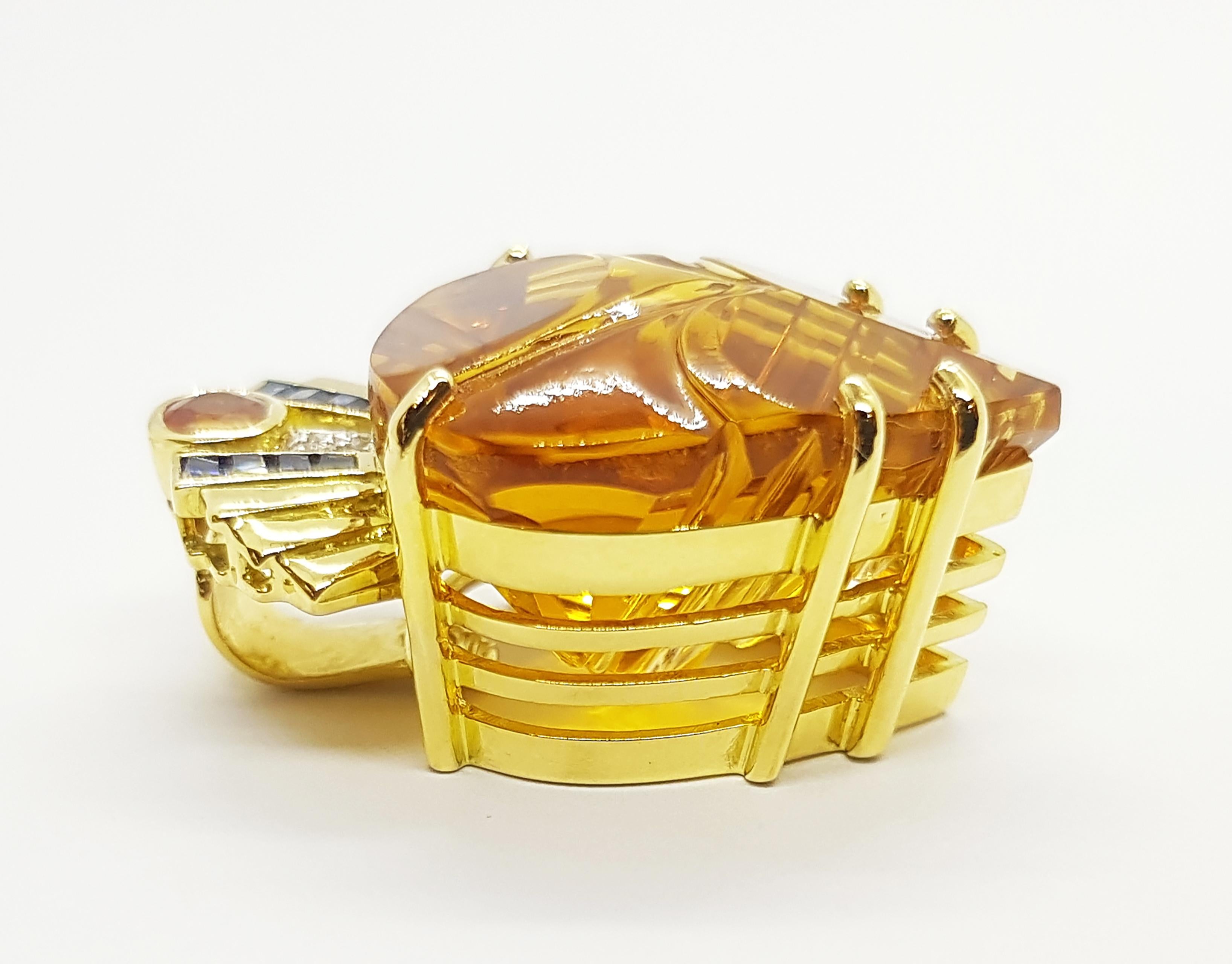 Citrine 32.49 carats with Diamond 0.05 carat, Yellow Sapphire 0.73 carat and Blue Sapphire 0.66 carat Pendant set in 18 Karat Gold Settings
(chain not included)

Width:  2.0 cm 
Length: 30 cm
Total Weight: 15.56 grams

