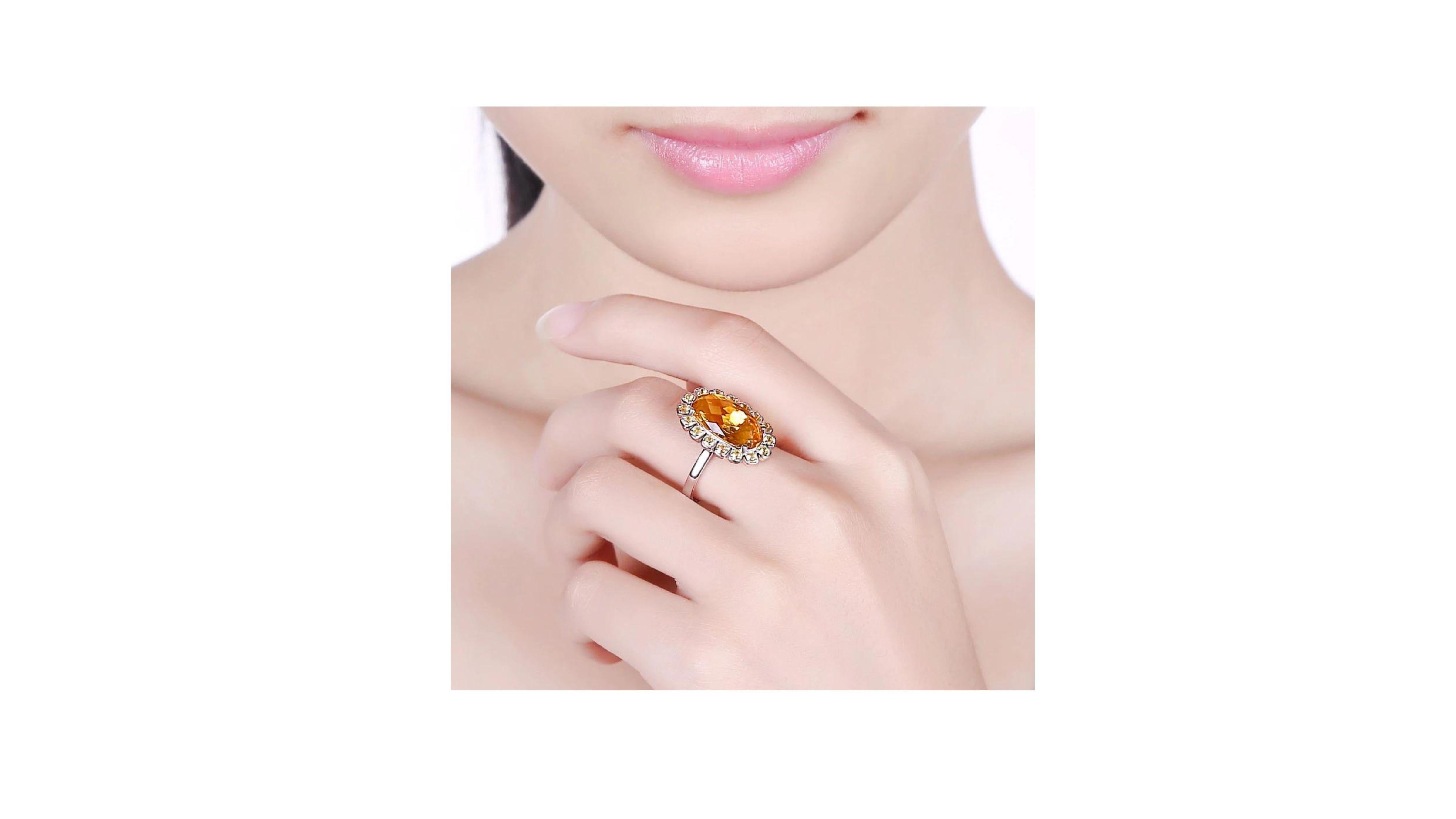 

This is a unique Citrine ring with 17 Yellow Sapphires set in 14k White Gold which really stands out  with a 5.9ct Stone  If you are looking for something specific let us know and your size too . 


 5.9ct Citrine(About 9x16mm Oval)

  
 Color: