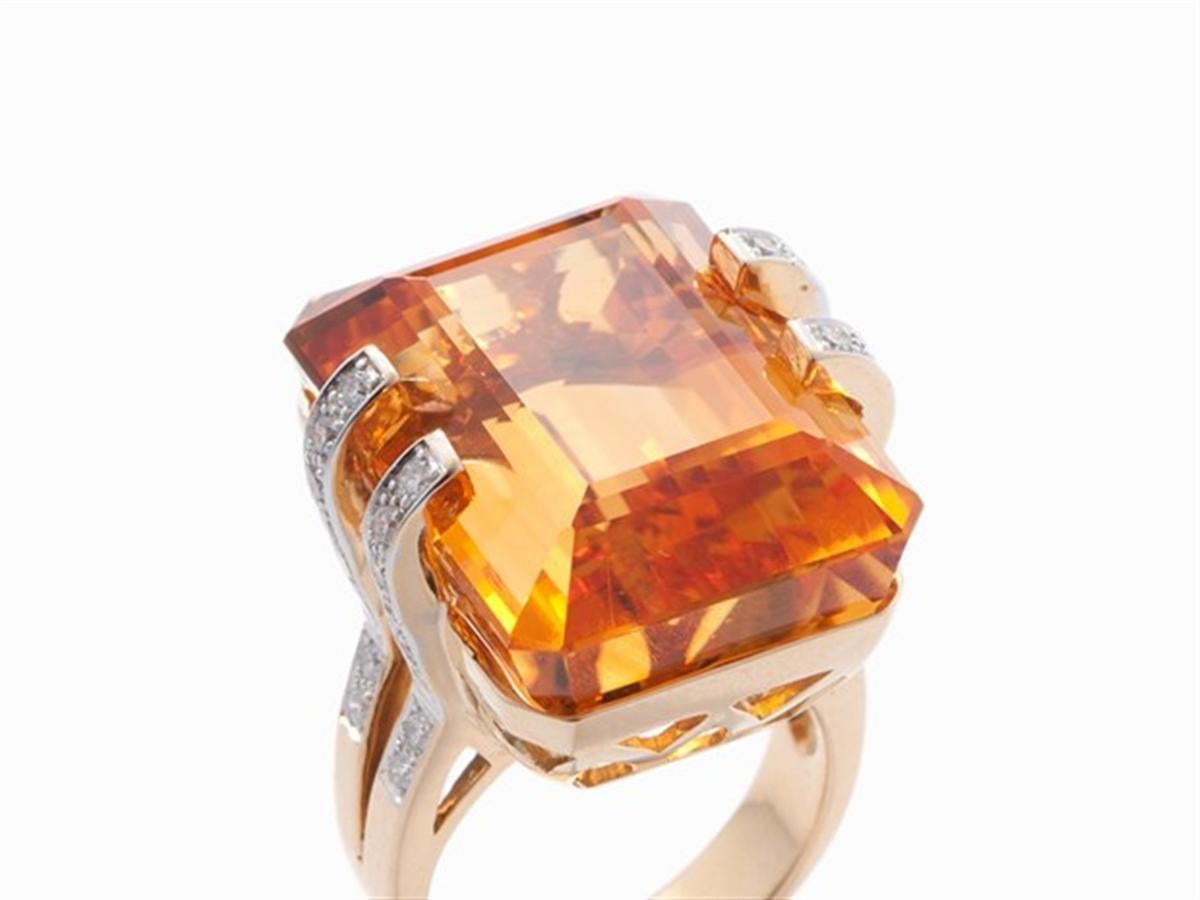 Bague en or avec citrine et 32 brillants, or 18 carats

Delin
- Or jaune 18 carats
- Italie, 21e siècle
- Poinçonné avec le titre 