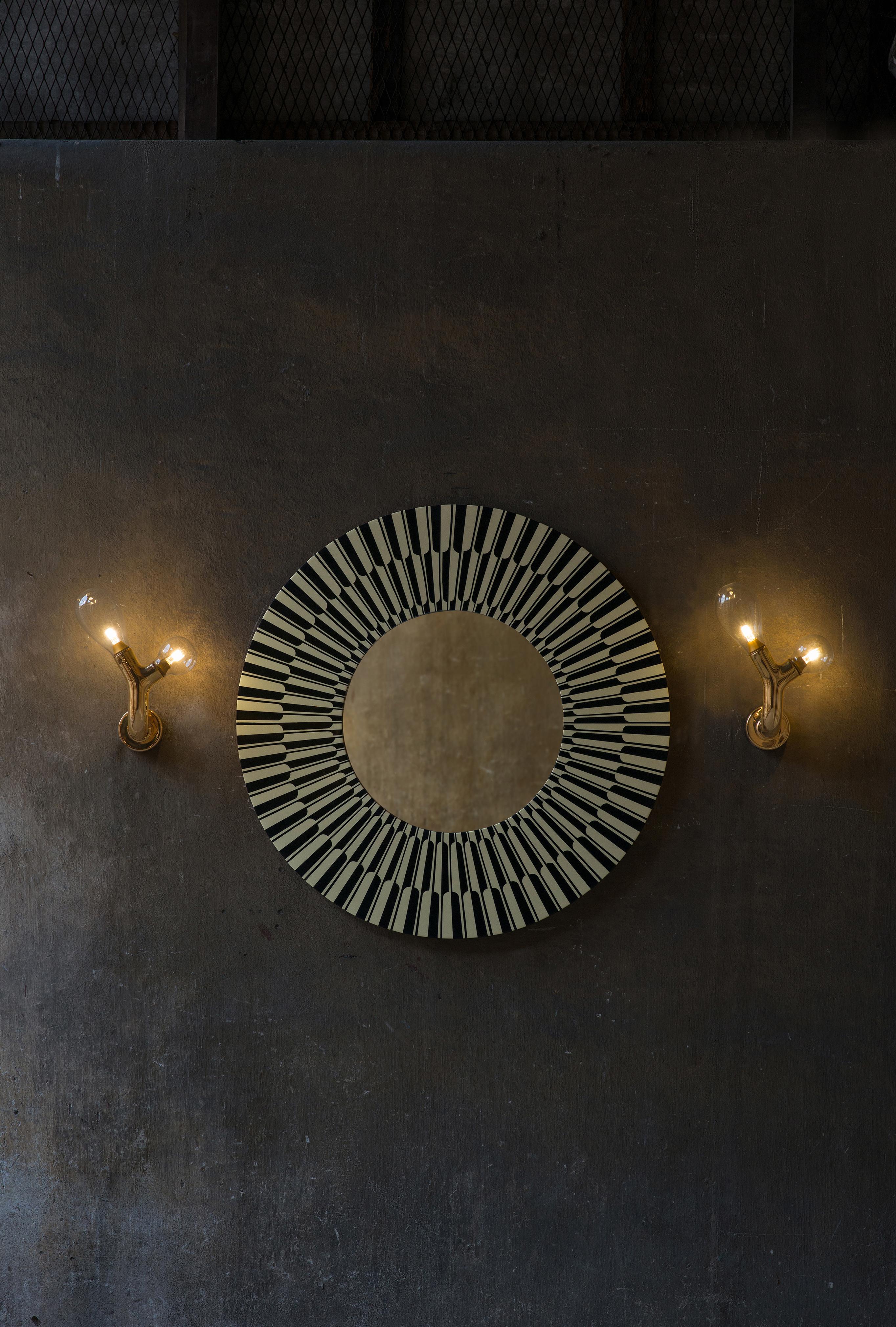 Citylights Wall Console Mirror Black and White by Matteo Cibic is a stunning large circular mirror.

India's handicrafts are as multifarious as its cultures and as rich as its history. The art of bone and horn inlay is omnipresent here. Artisans