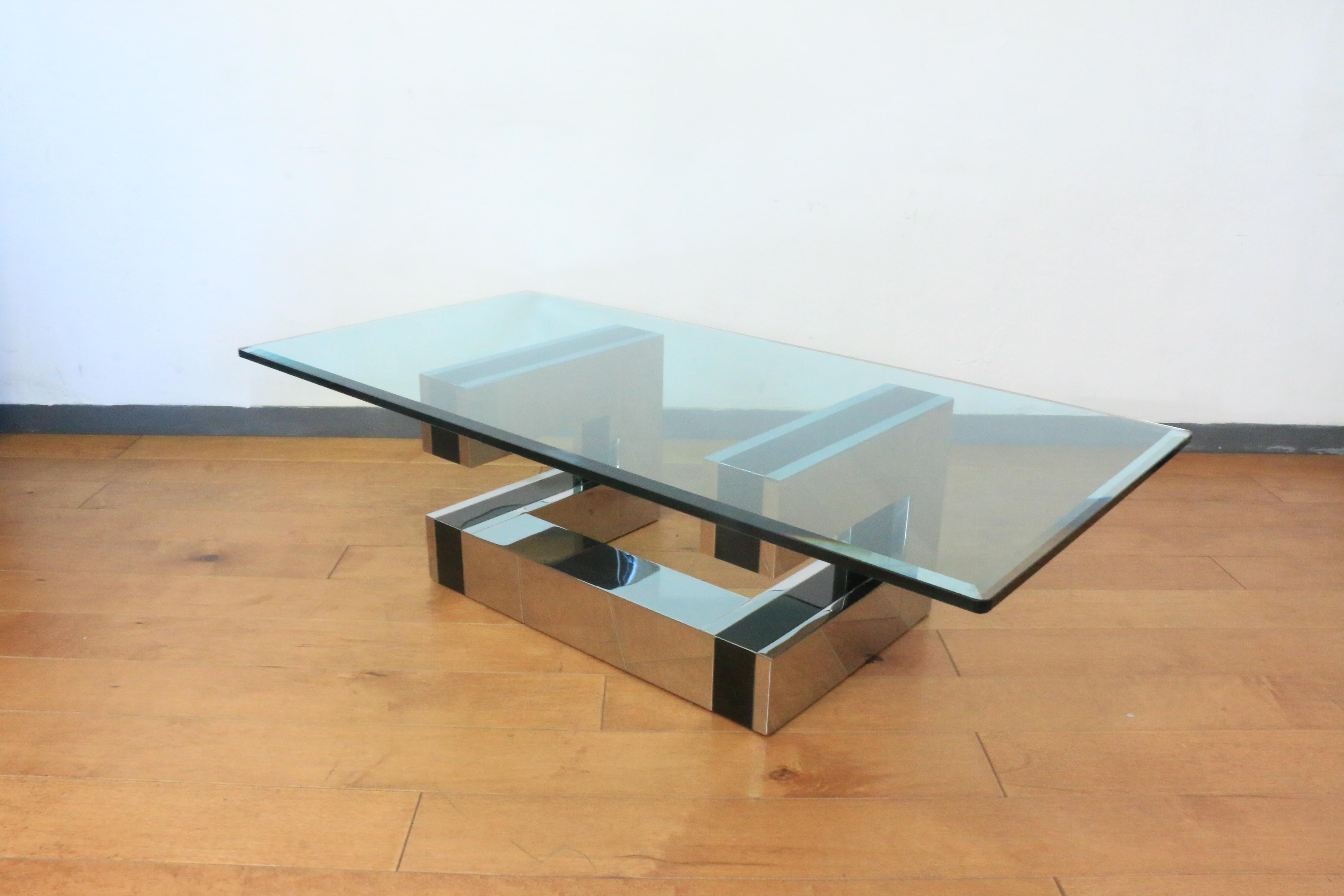 Vintage cityscape coffee table with glass top attributed to Paul Evans. 
Has black accent detail on the base. Great style and amazing look. Mid-Century Modern style. Chrome has minor signs of use and wear.