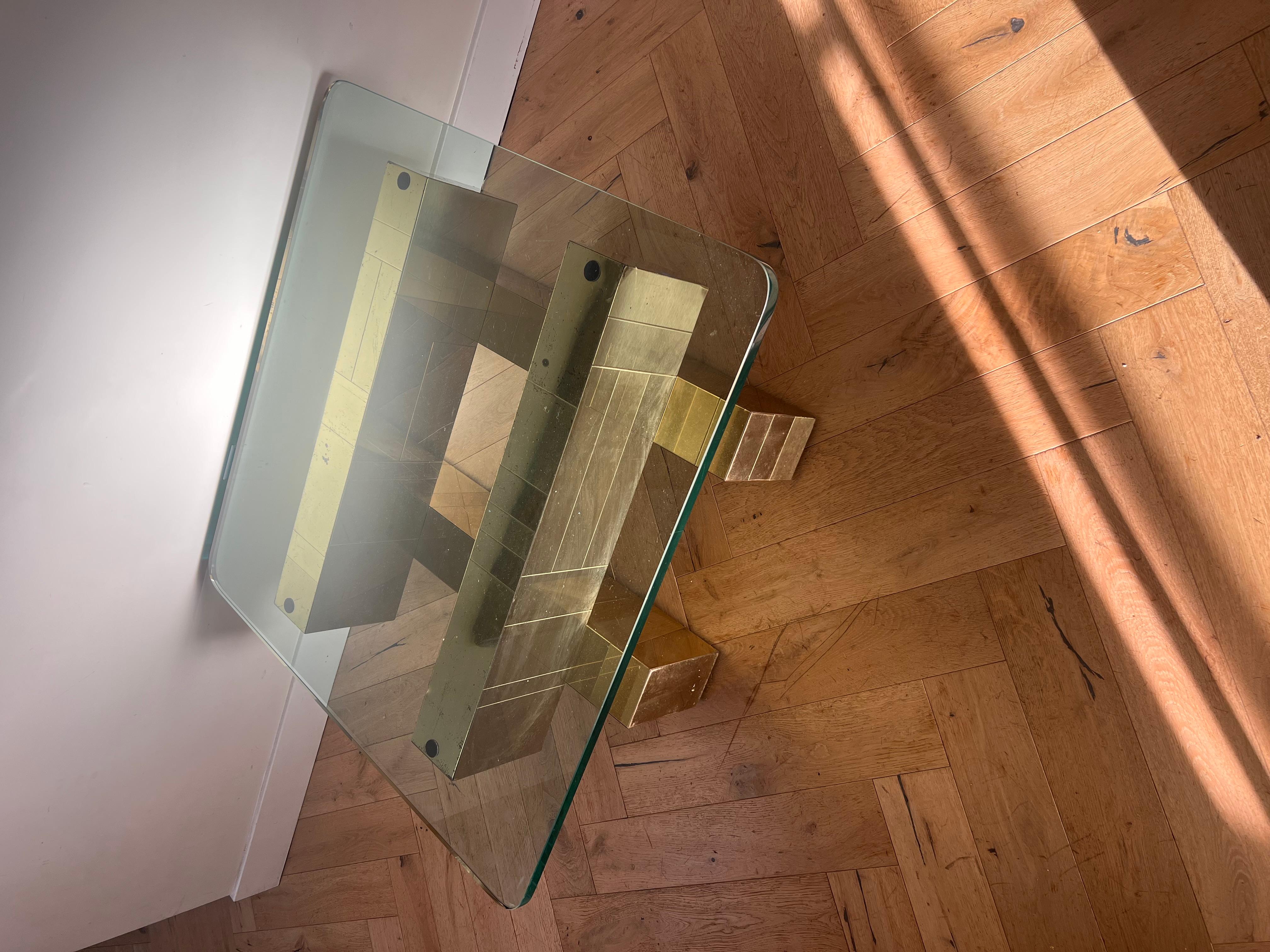 A « cityscape » coffee table by Paul Evans for Directional in gold, early 1970s. Glass is original and in good vintage condition with typical light scratches. Some significant patina on metal base. Pick up in central west Los Angeles or we ship