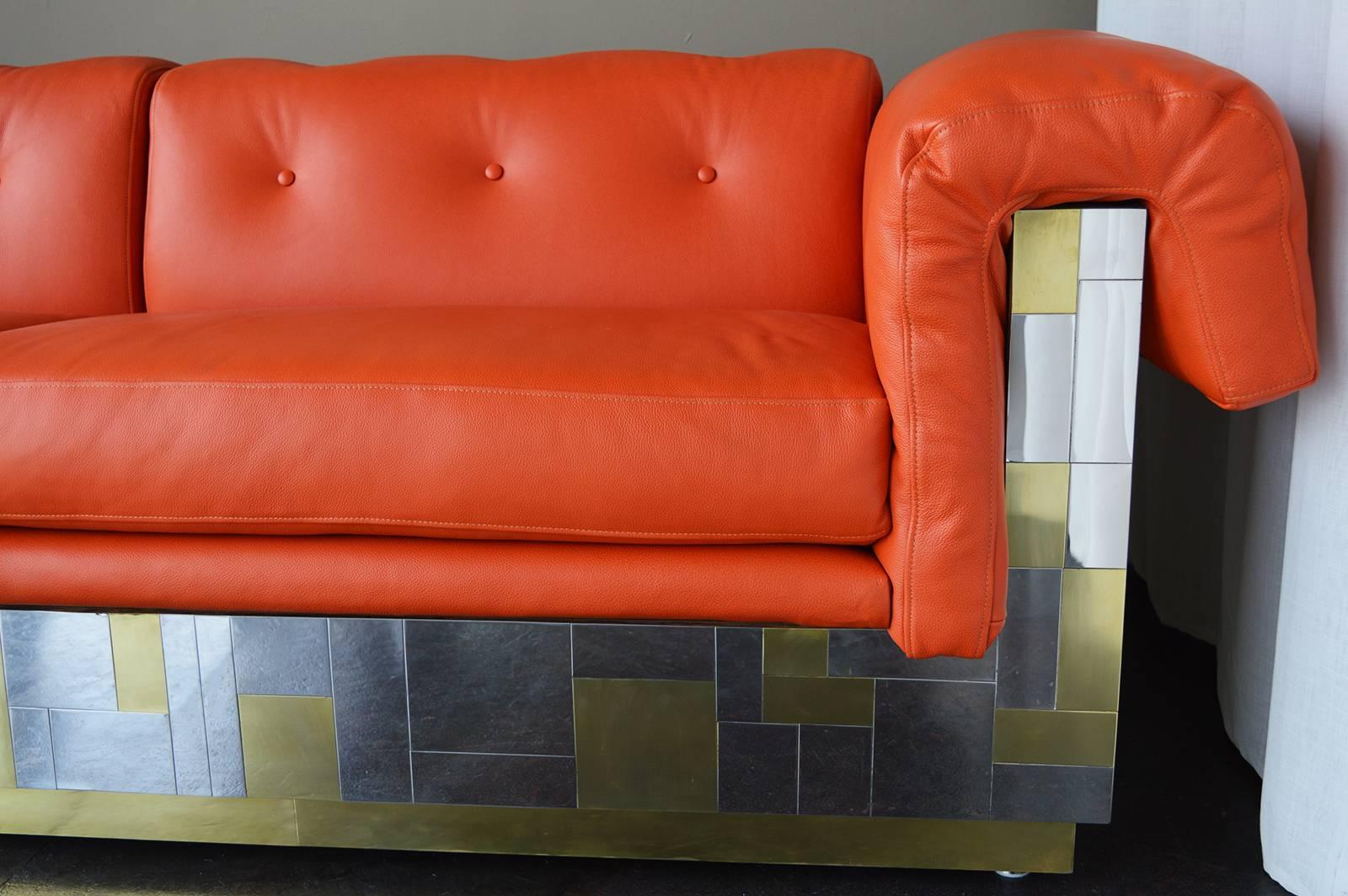 Cityscape sofa by Paul Evans. Hermes orange leather, custom upholstery.
Measure: 19