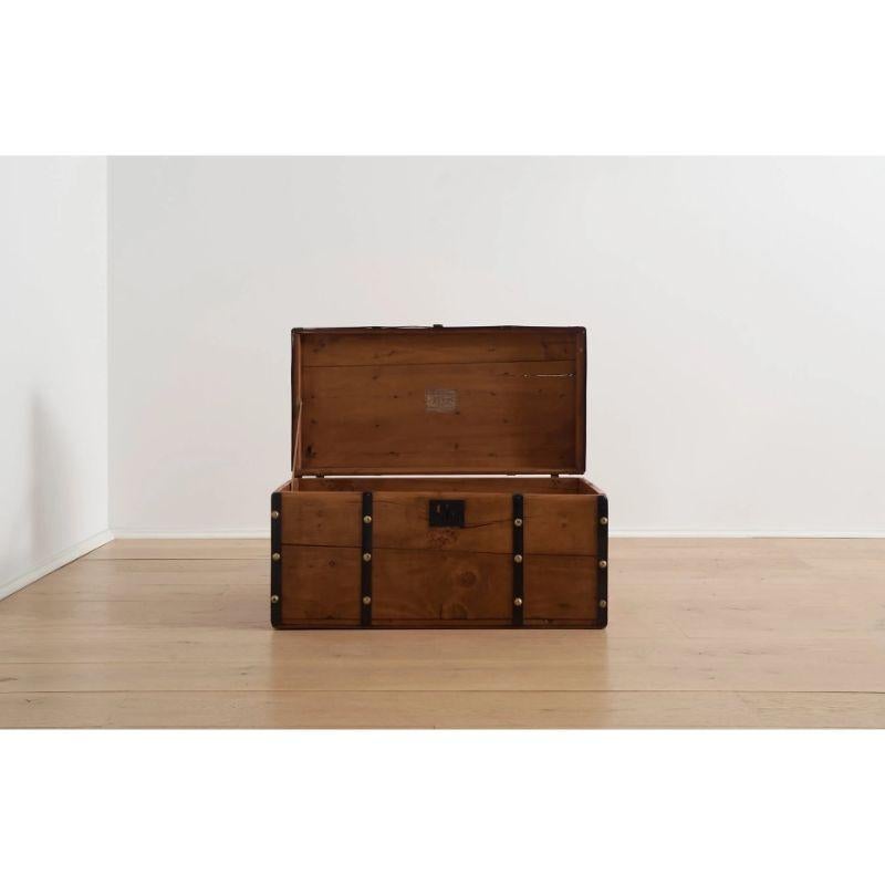 This Civil War Era Trunk crafted from hardwood with black steel bands with brass buttons is a piece of American history that will serve you today as extra storage or a utilitarian side table.

At ZZ, we had the great pleasure to purchase the entire