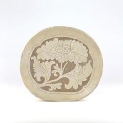 Cizhou carved bean-shaped pillow, Song-Jin Dynasty, 11th-12th century