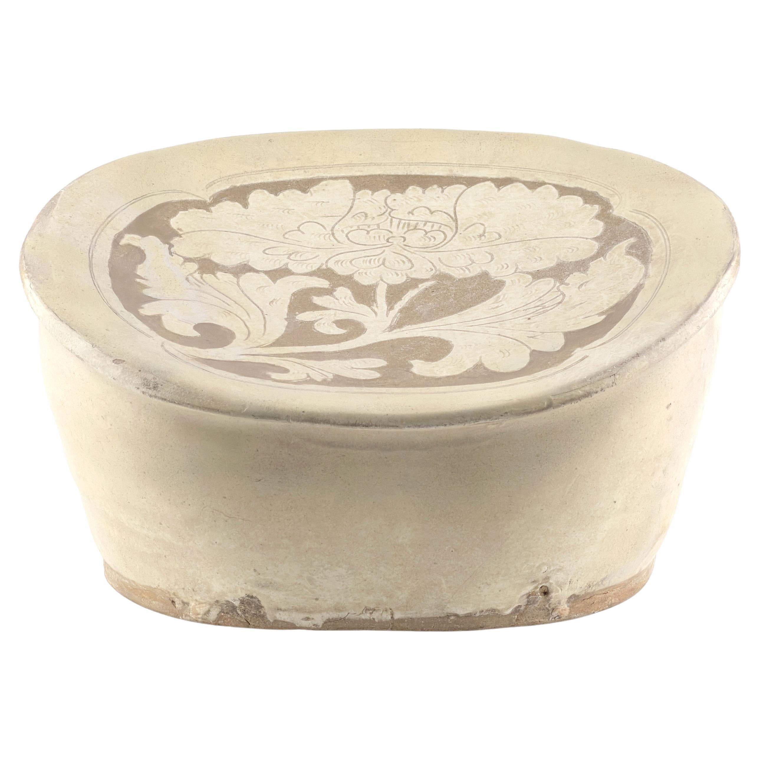 Cizhou carved bean-shaped pillow, Song-Jin Dynasty, 11th-12th century