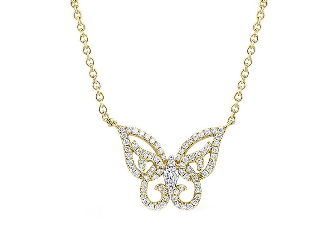 Ethereal butterfly motif necklace set with 0.48 ctw of round diamonds. The scintillating diamond butterfly hangs on a 18 kt yellow gold chain with two shimmering bezel set diamonds on each side.