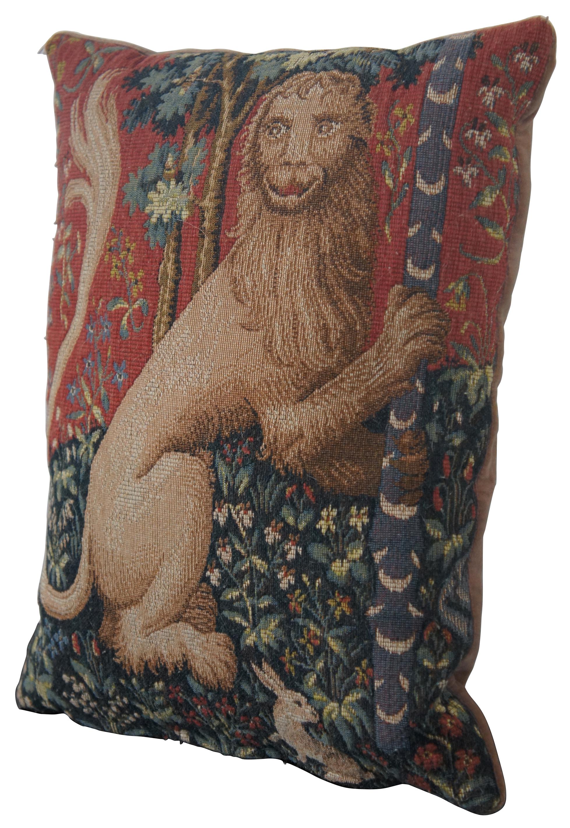 Medieval style, down filled, embroidered throw pillow with velour back featuring a heraldic lion and rabbits among trees and flowers, made in France for CJC of St Simons Island, GA.
 