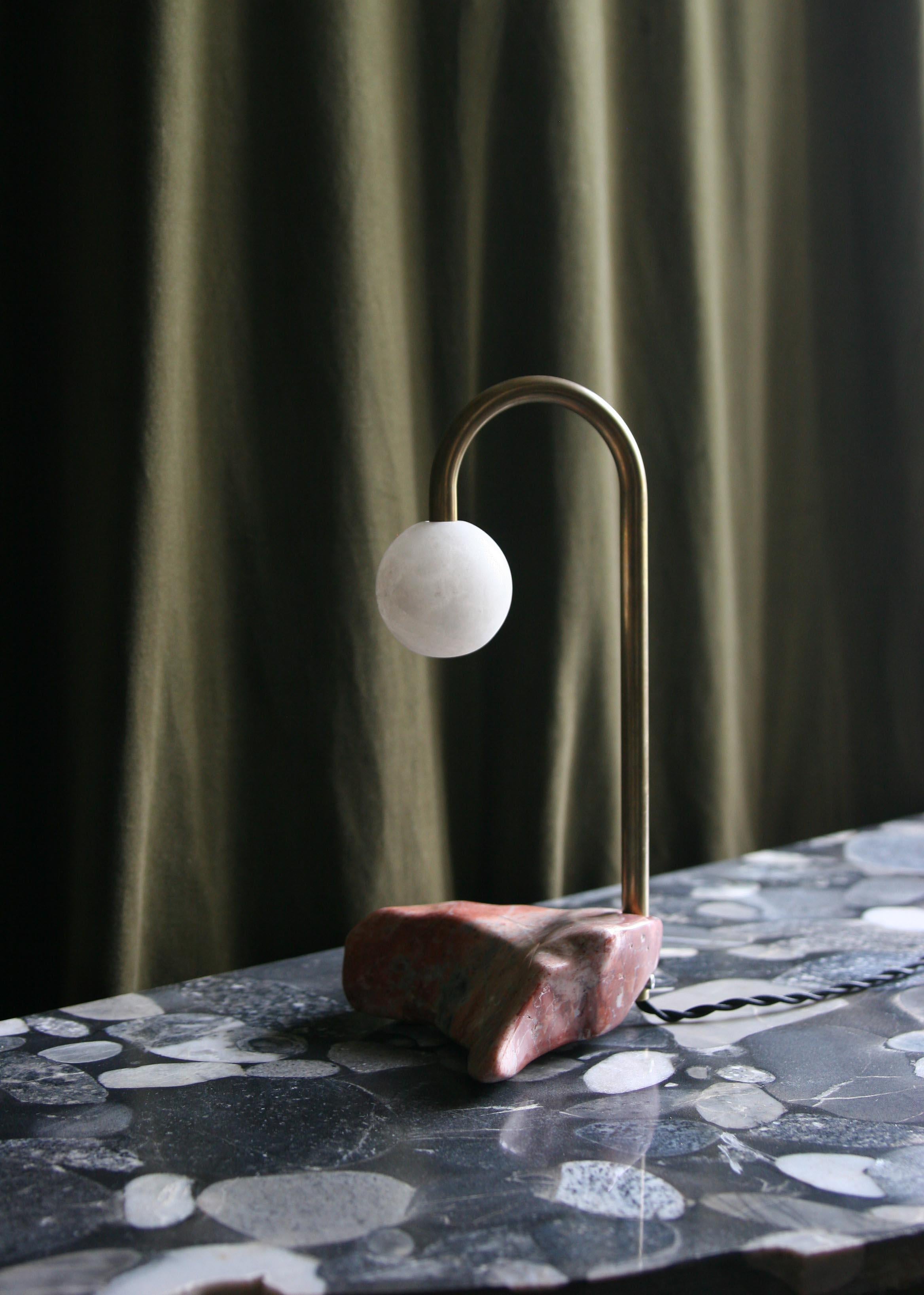 CL-oo cane lamp by Krzywda.
Dimensions: 19L x 16D x 30H cm.
Materials: Alabaster, brass, marble.
Each base is sculpted by hand and varies from piece to piece in shape, color and weight.

All lamps could be wired for each