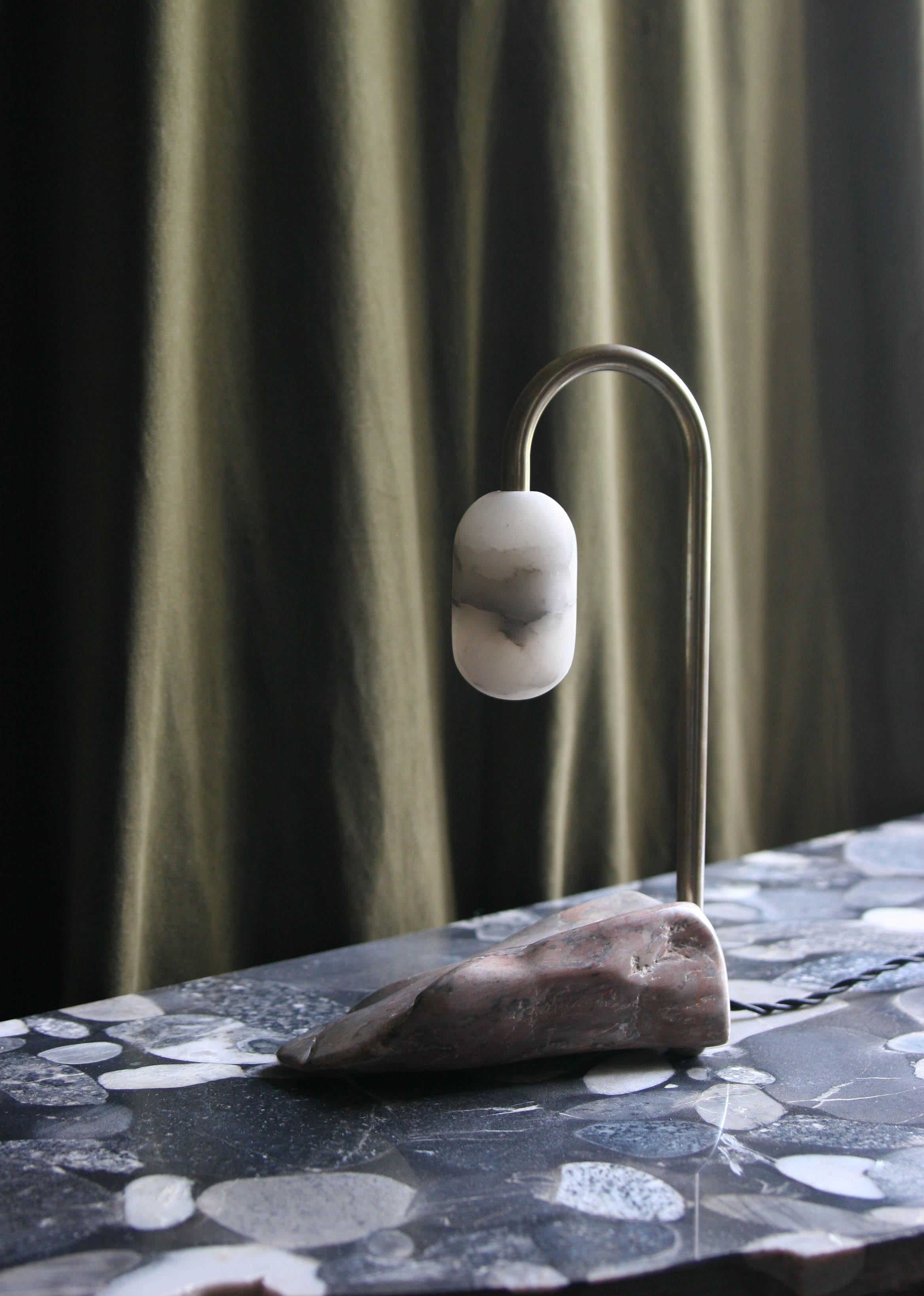 CL-oo Cane lamp by Krzywda.
Dimensions: 19 L x 16 D x 30 H cm.
Materials: Alabaster, brass, marble.
Each base is sculpted by hand and varies from piece to piece in shape, color and weight.

All lamps could be wired for each