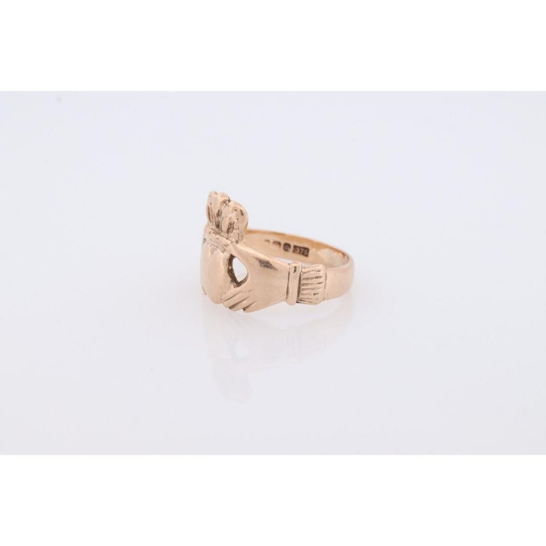 Vintage
Materials: Gold
Band Color: Yellow

Style: Minimalist

Iconic Irish Claddagh Ring. Represents Love Loyalty and Friendship.

Vintage age with European hallmarks.

Details:
sz 6.75
9k Yellow Gold
3.1g total
14mm wide heart