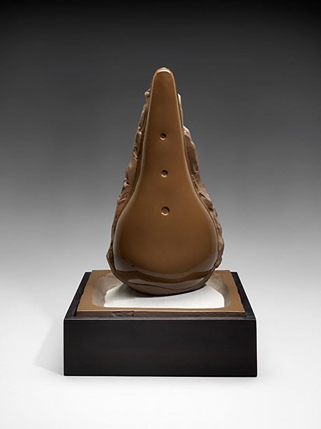 Glazed Ceramic, sand with mahogany base 
Signed and numbered
Edition of 36