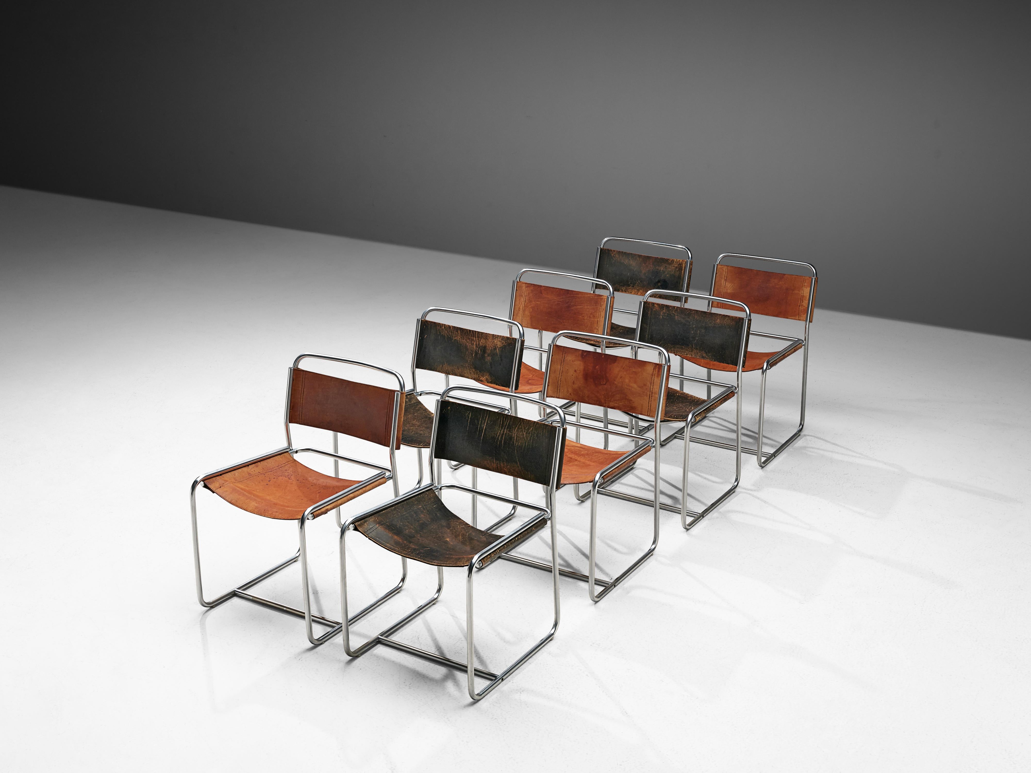 Claire Bataille and Paul Ibens for 't Spectrum, dining chairs, metal and leather, Netherlands, 1971. 

Eight tubular chairs with four with natural and four with black saddle leather seating and back. The frame consist of thin tubular steel formed
