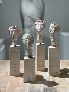 Artists & Poets by Claire McArdle. 4 Terra cotta sculptures on stone bases. 