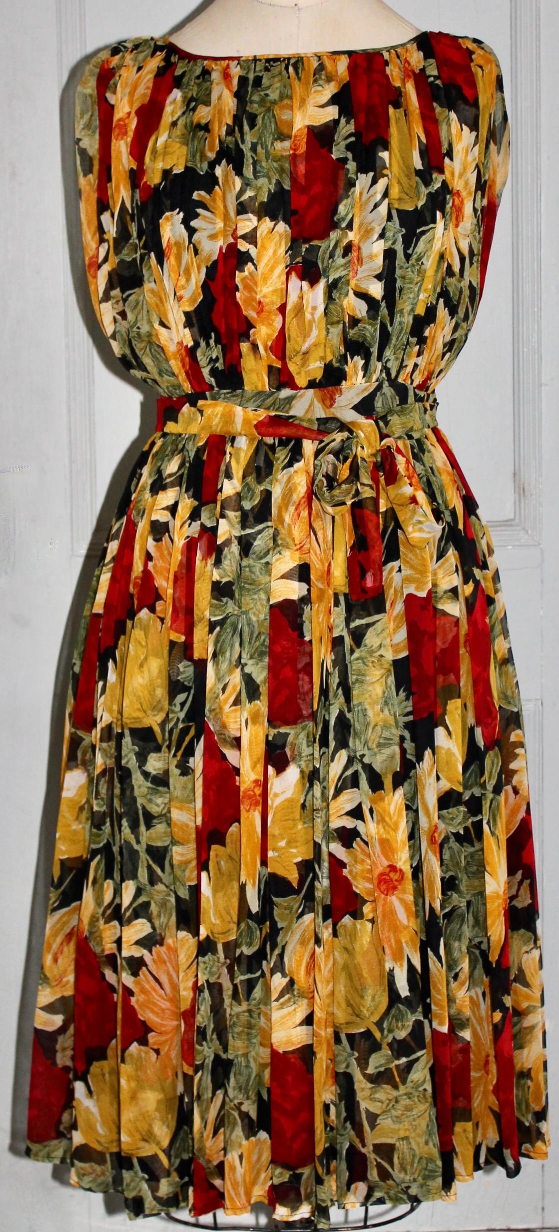 Offering a Floral Chiffon Dress by Townley (labeled), the design attributed to
Claire McCardell.  Approximate size: 8, length 43