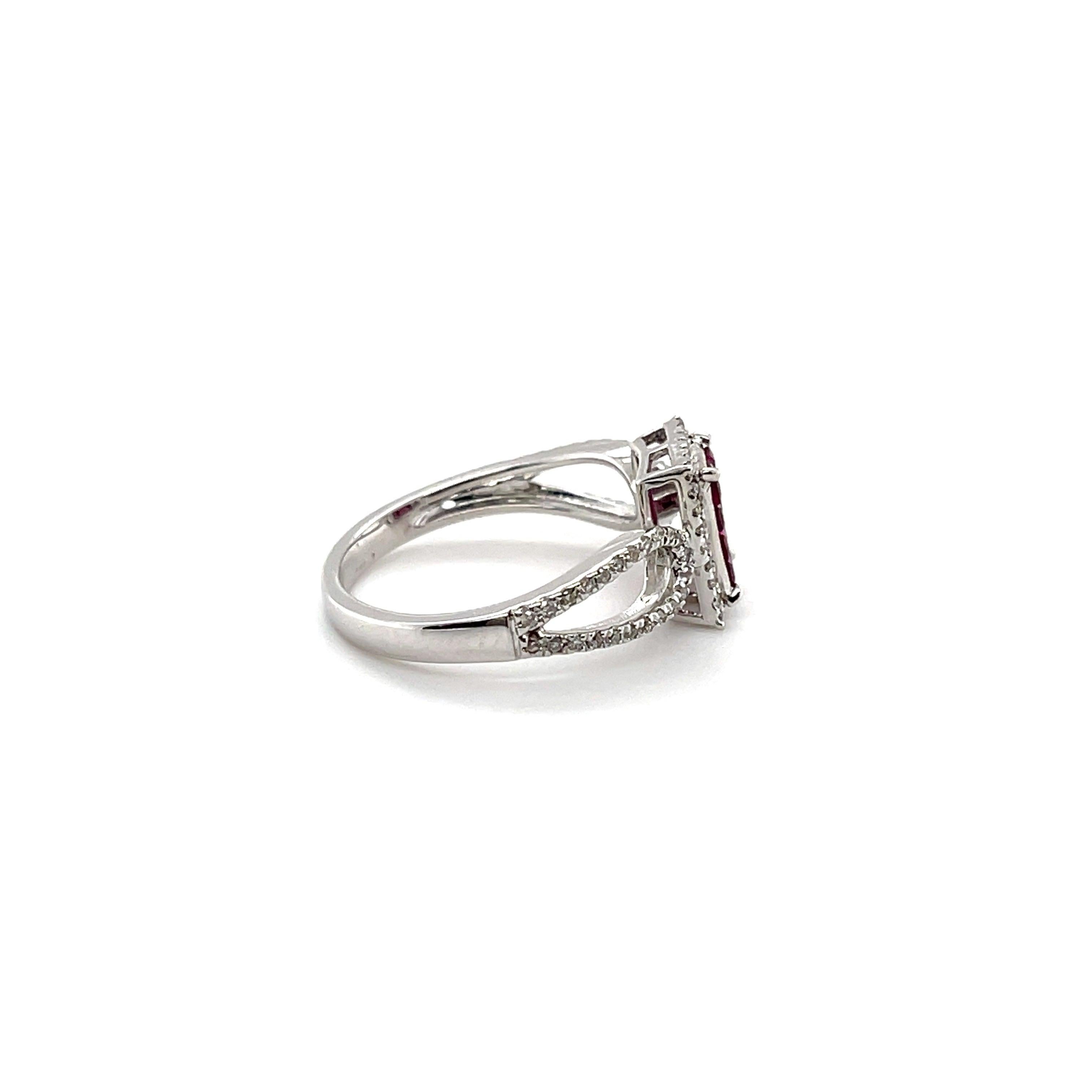 Ruby and diamonds, crafted in eighteen karat white gold, complemented by a polished finish design. 

Ruby weight: 0.46CT 

Diamond weight: 0.20CT 

Item Weight: 2.89G 

18KWG 

Complimentary resizing upon purchase!


