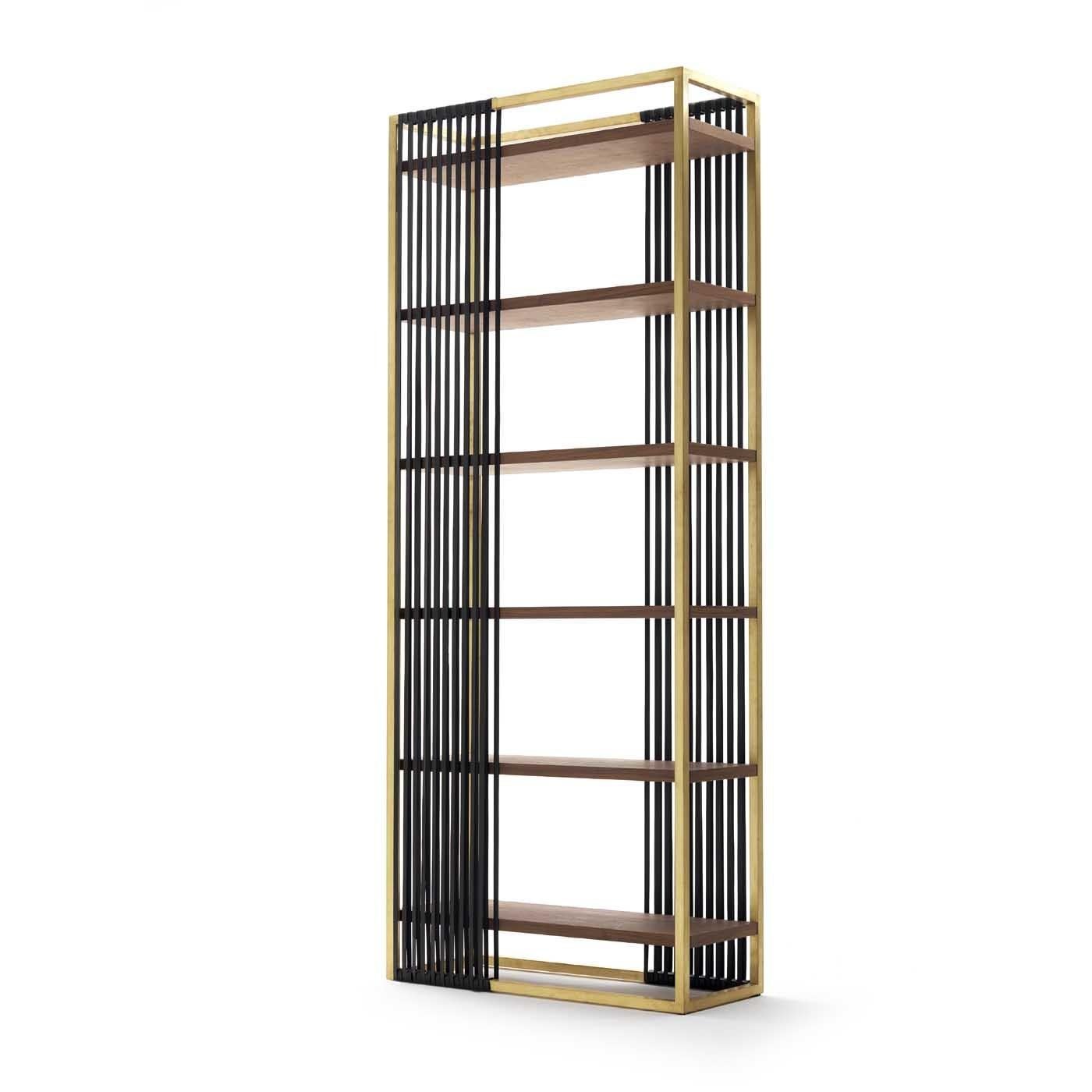 This elegant bookcase is part of the Claire collection, distinctive for its linear silhouette, superb materials used, and striking finishes. This piece has a metal structure with a satin brass finish that creates an elongated rectangle that contains