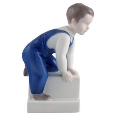 Vintage Claire Weiss for Bing & Grøndahl. Porcelain figure. Boy. 1970s.