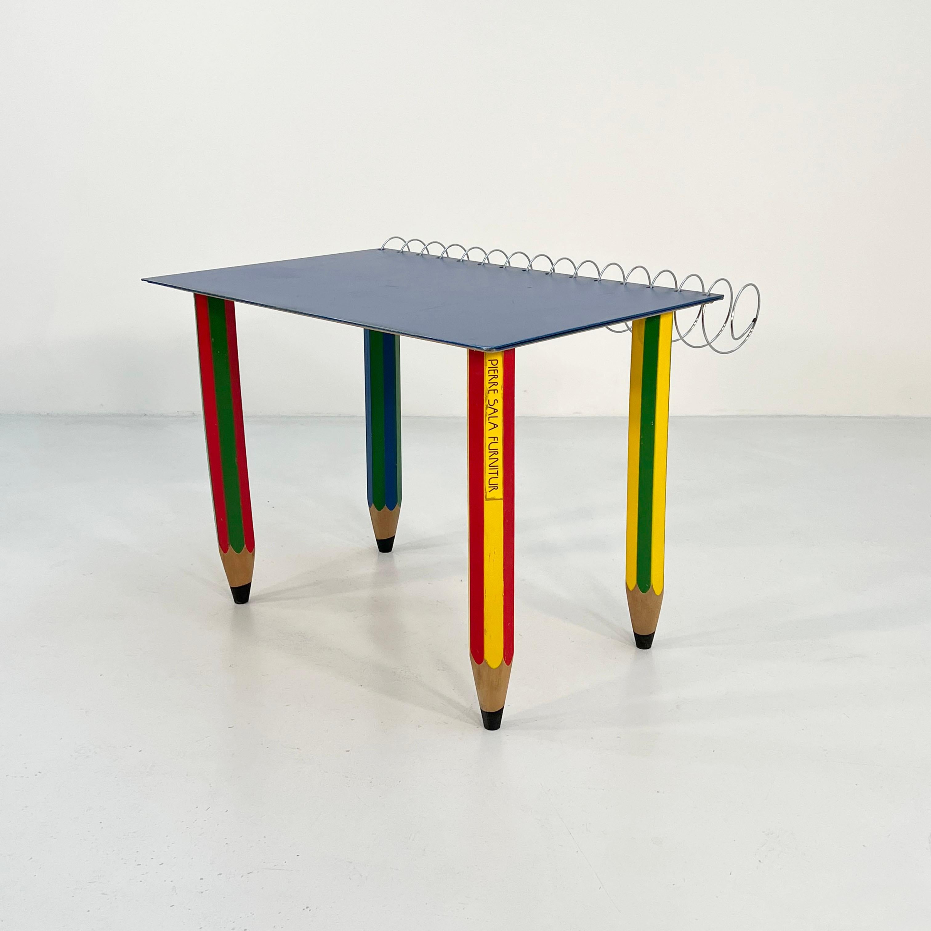 Clairefontaine Desk by Pierre Sala for Chambon, 1984
Designer - Pierre Sala 
Producer - Chambon
Model - Clairefontaine Desk 
Design Period - 1984
Measurements - Width 92 cm x Depth 70 cm x Height 69 cm
Materials - Metal, Wood
Color - Blue, Red,