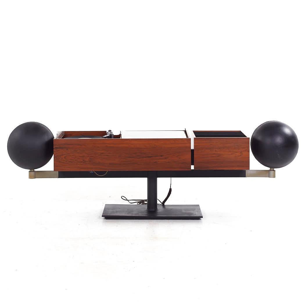 Clairtone Project G2 Mid Century Rosewood and Chrome Stereo Turntable

This stereo turntable measures: 80 wide x 14.75 deep x 25.25 inches high

All pieces of furniture can be had in what we call restored vintage condition. That means the piece is