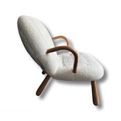 'clam' chair Arnold Madsen style oak and lambskin Sweden 1990s
