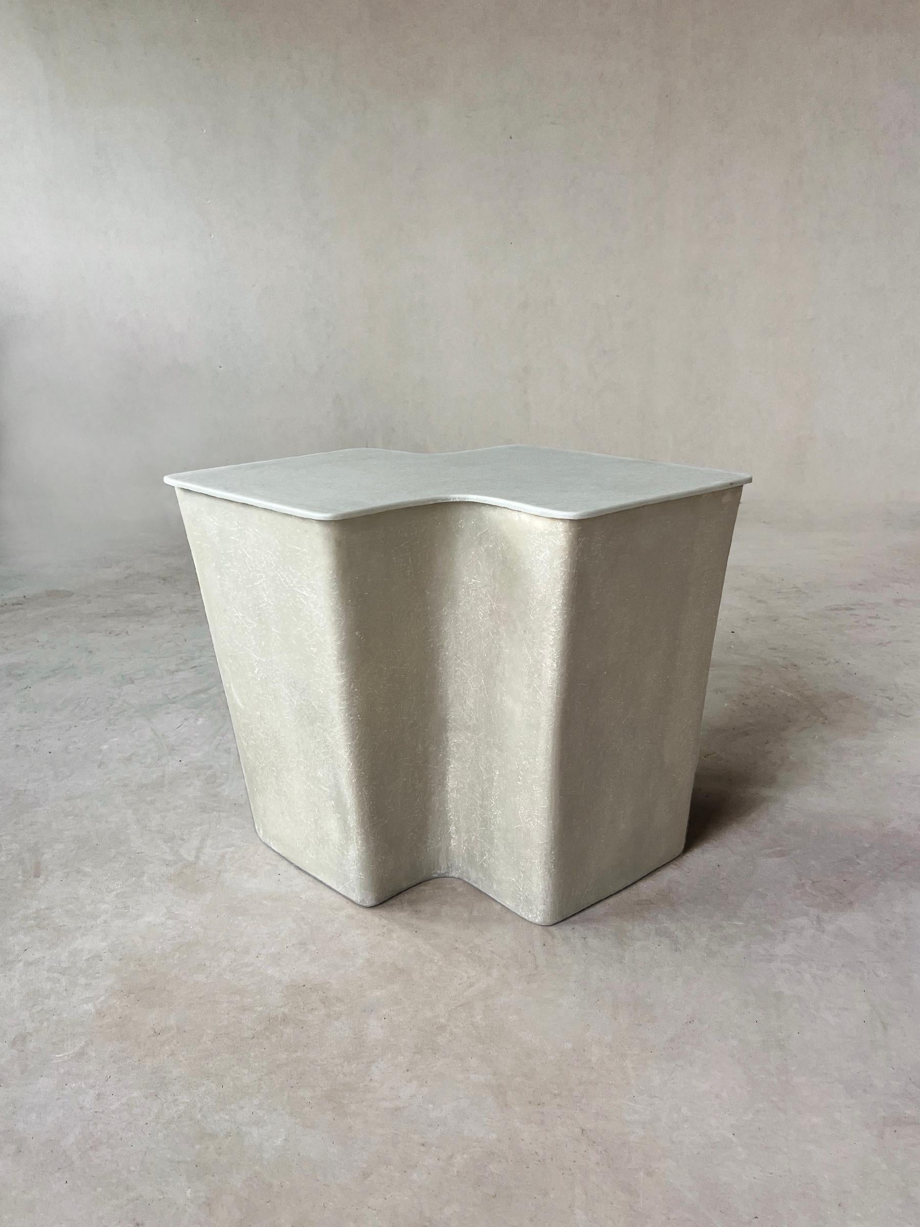 The artisanal process of creating our Clam Side Table gives each piece an individual soul and patina, as the temperature, humidity and hands at work all contribute to its distinctiveness. 

It is a reaction to the mass-produced and industrial,