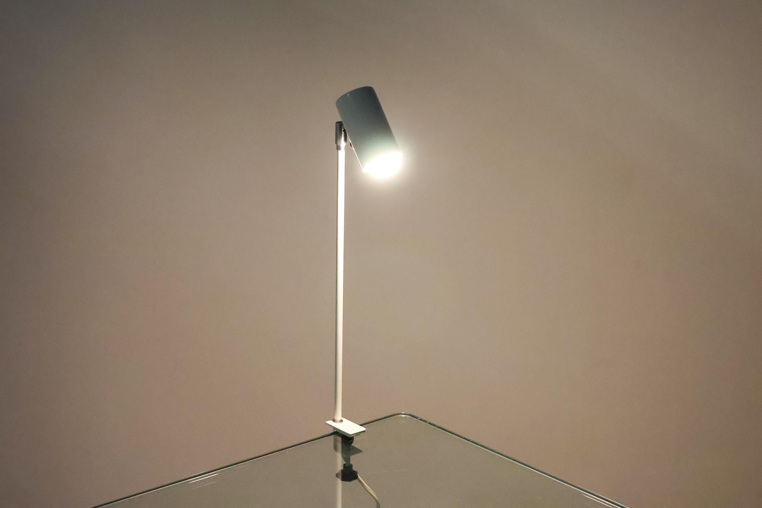 Minimalist design SIS clamp lamps to highlight your art or your book collection.
Also suitable as a minimalist work lamp. 
Adjustable shade. 
Five lamps available, priced individually.