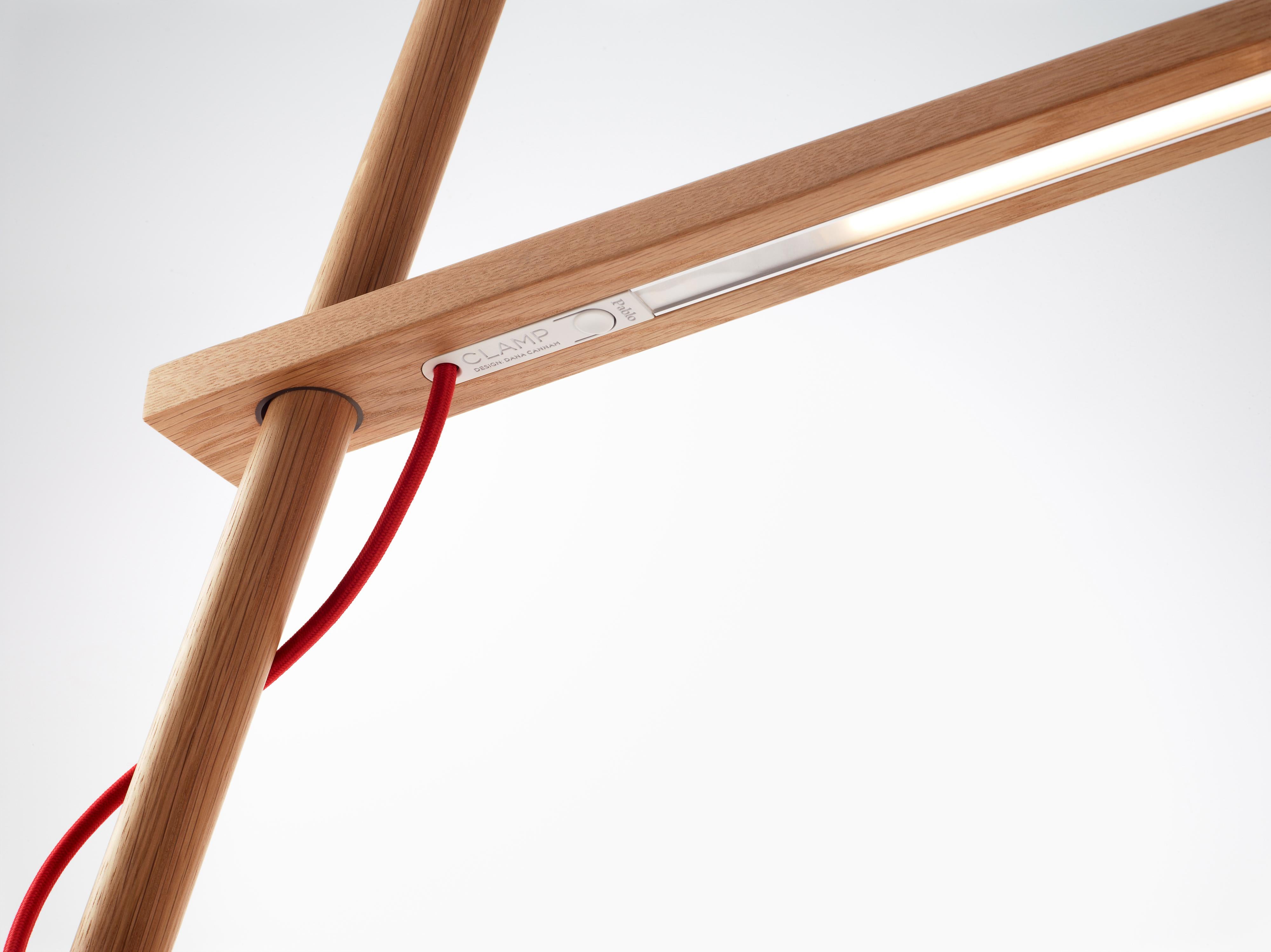 Designed for simplicity and engineered for sustainability, Clamp combines the beauty of wood with the brilliance of LED technology. Clamp is comprised of 3 main components that work together to provide infinite adjustment, while focusing warm,
