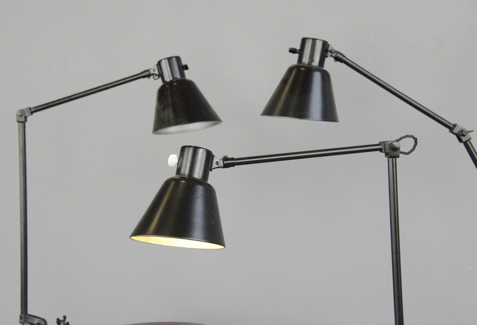 Clamp on industrial task lamps by Schaco, circa 1930s.

- Price is per lamp (1 available)
- Original porcelain switch
- Articulated arms
- Steel shade
- By Schanzenbach & Co, Frankfurt
- German, 1930s
- Measures: 91cm tall x 16cm wide x 45cm
