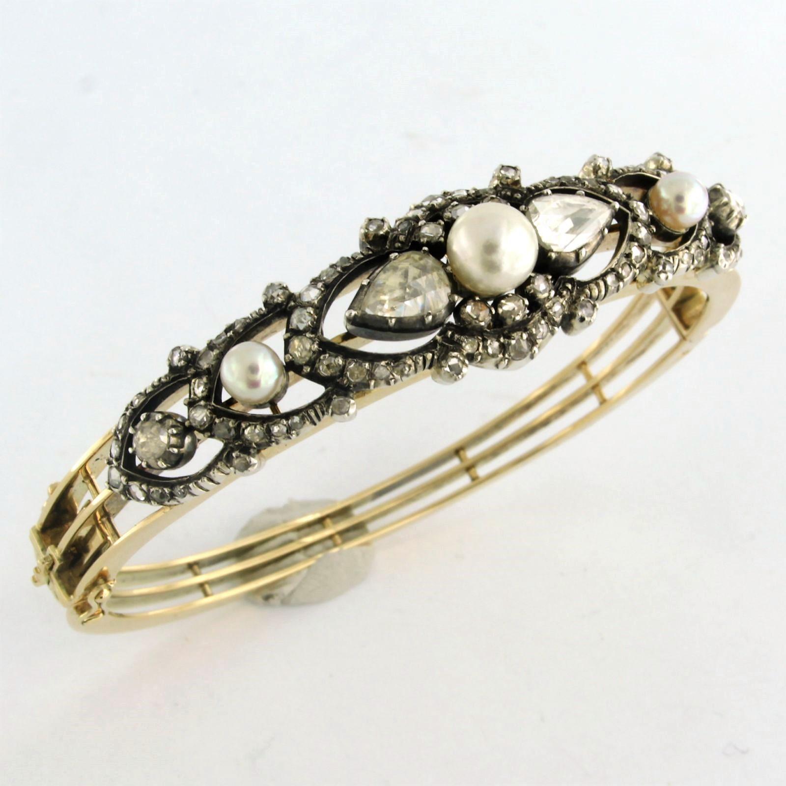 Clamper Bracelet set with pearls and diamonds 14k yellow gold and silver For Sale 3
