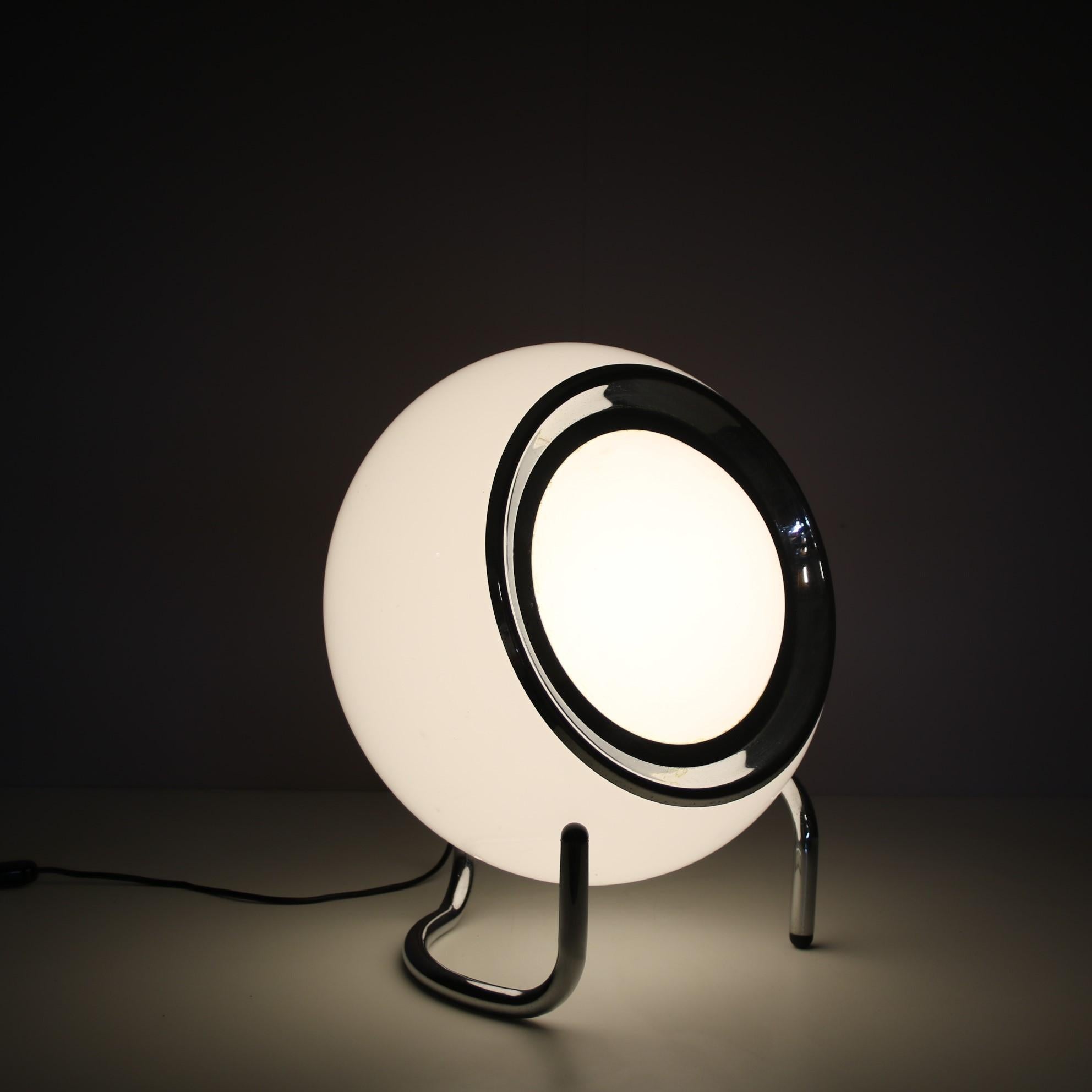 An eye-catching lamp, model “Clan”, designed by Harvey Guzzini & Studio 6G and manufactured by Guzzini in Italy around 1970.

Suitable as a floor lamp or table lamp, this versatile piece is an outstanding example of mid-century Italian design! Made